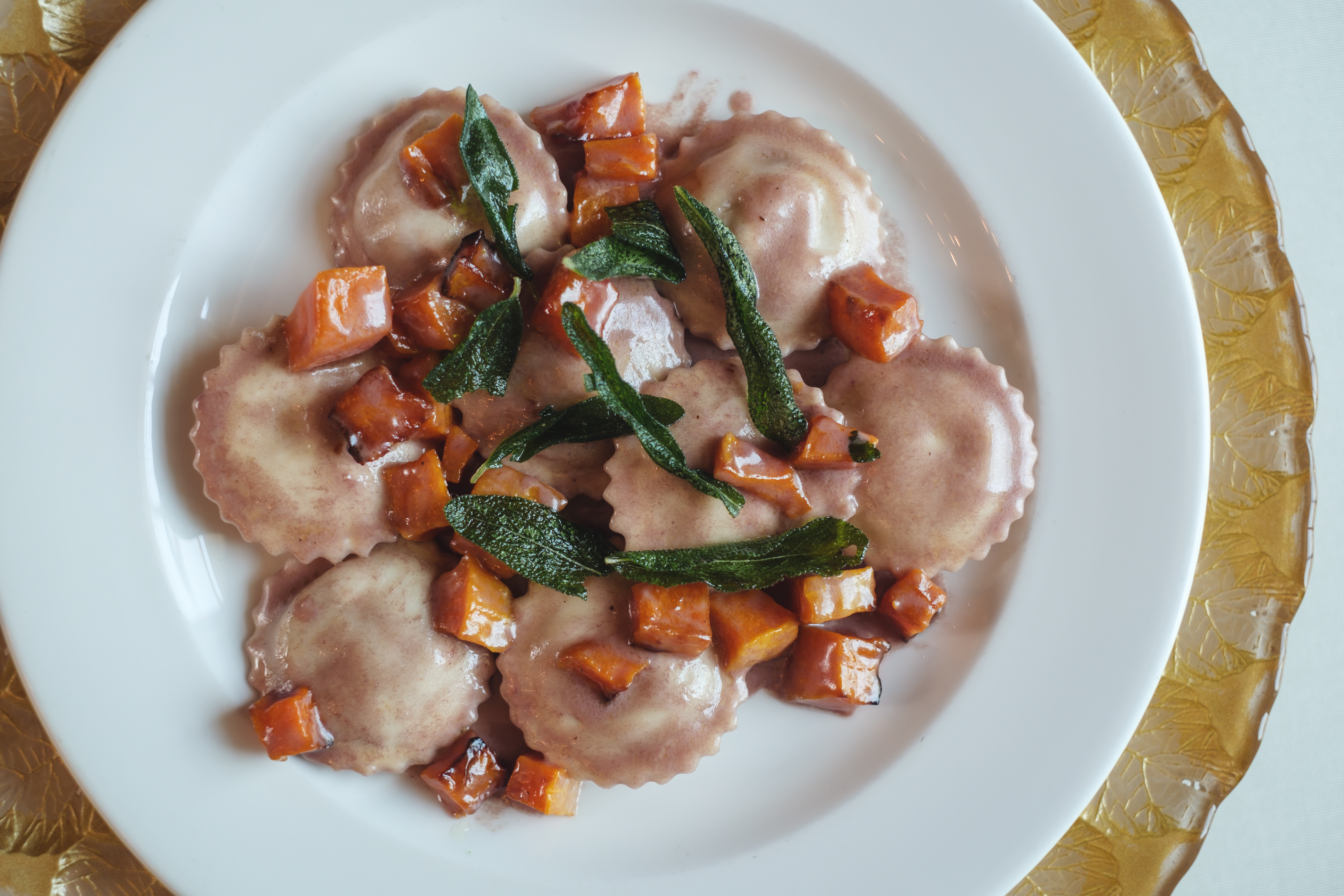 a plate of food with meat and vegetables