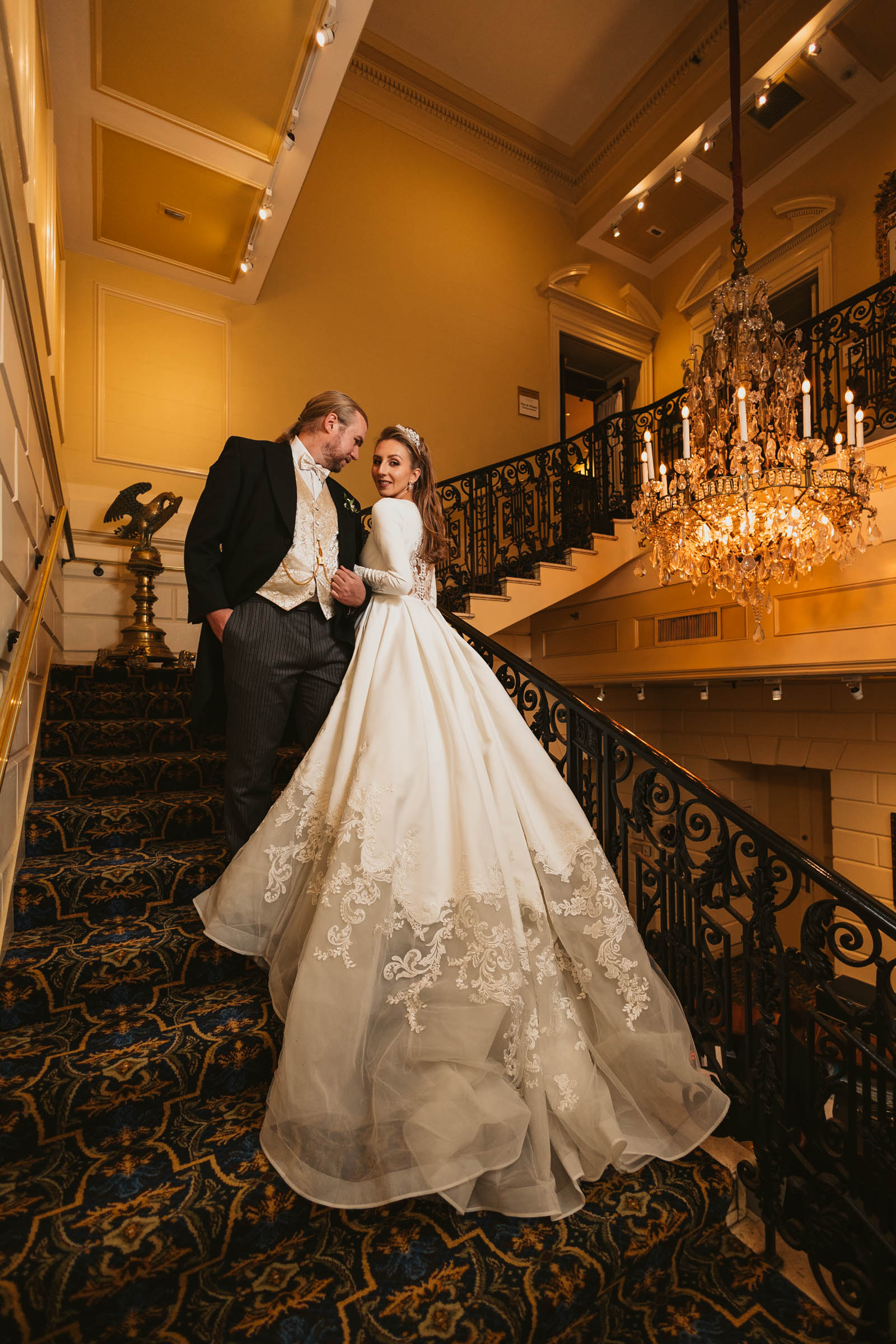 a person standing in front of a mirror posing for the camera