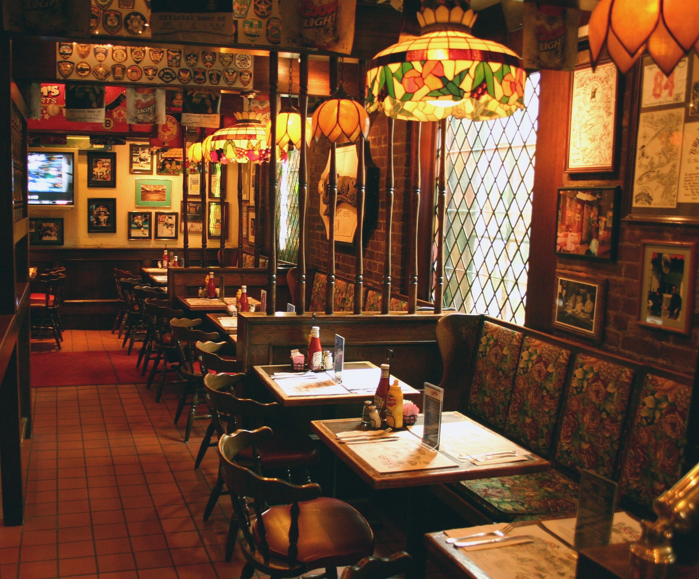a bar with tables and chairs