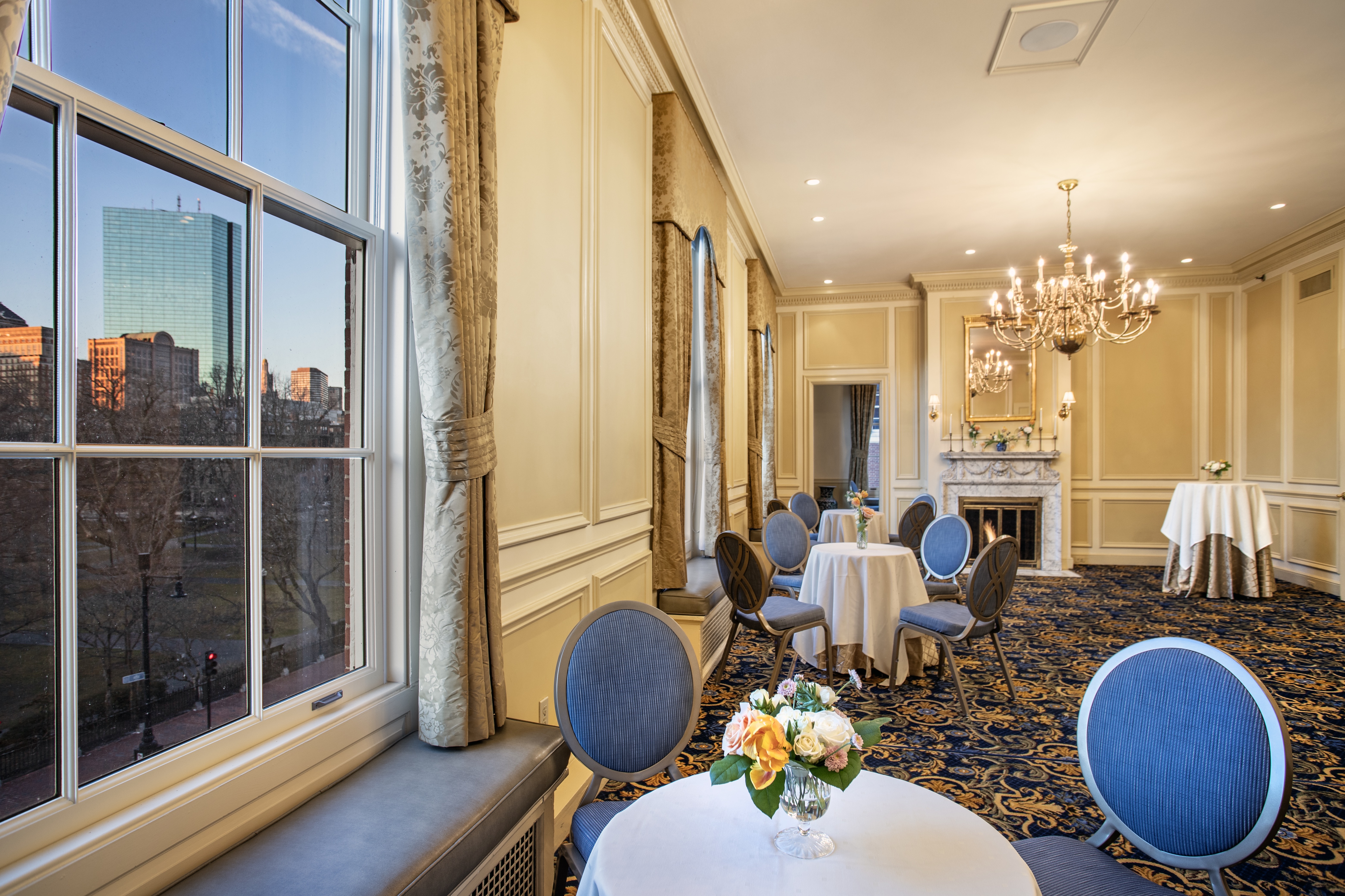 a room filled with furniture and a large window