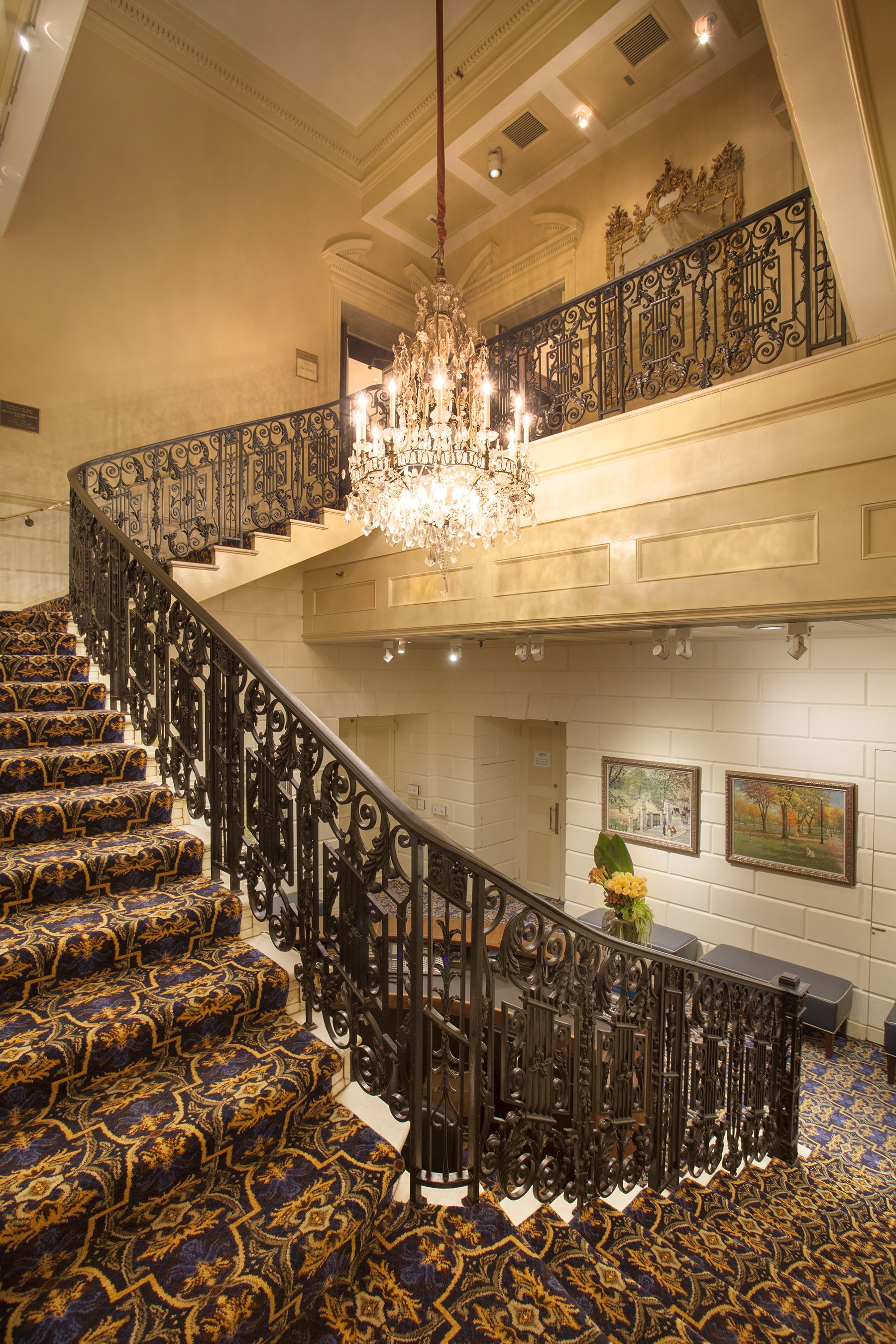 the lobby of a building with a staircase