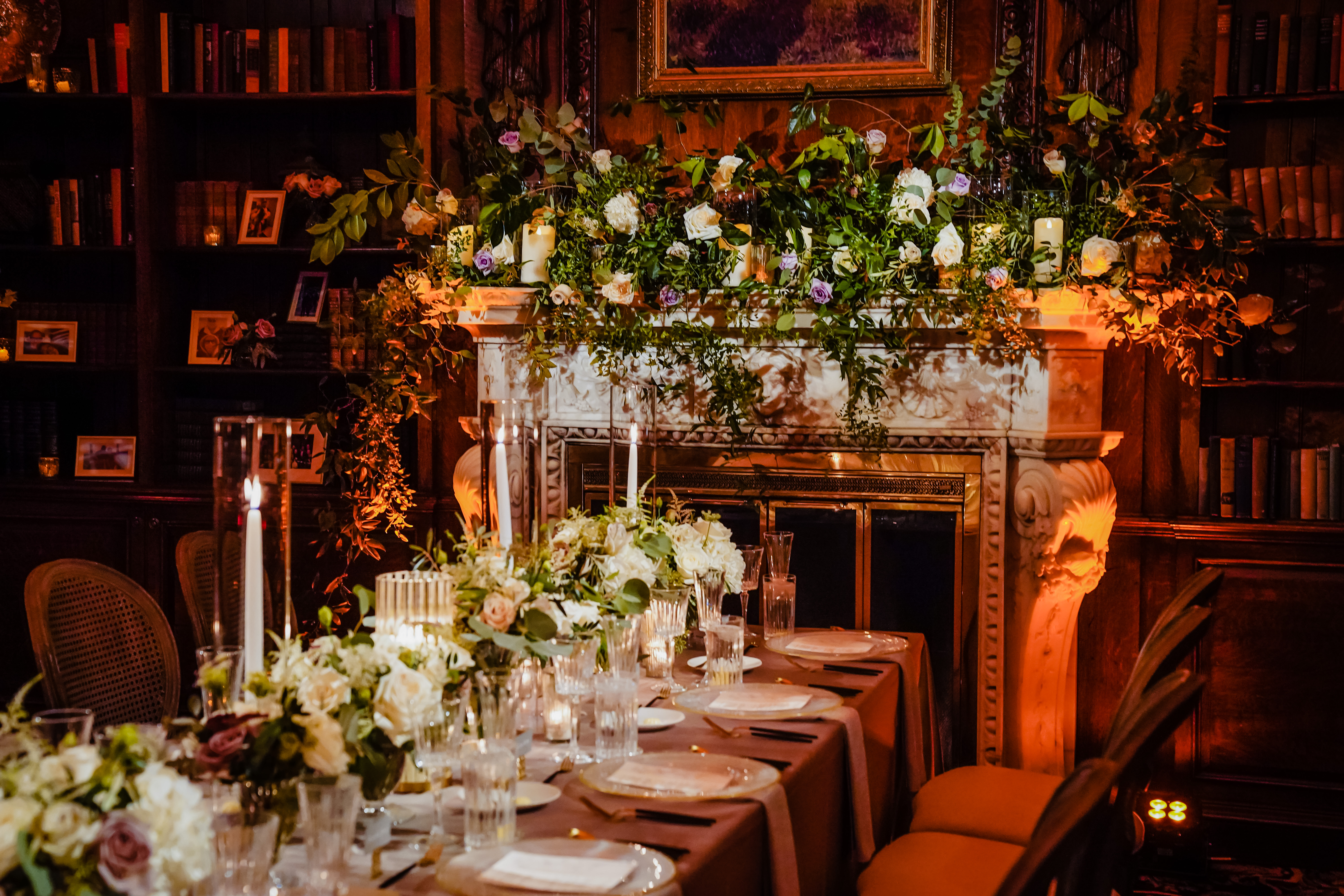 a set table in front of a fire place