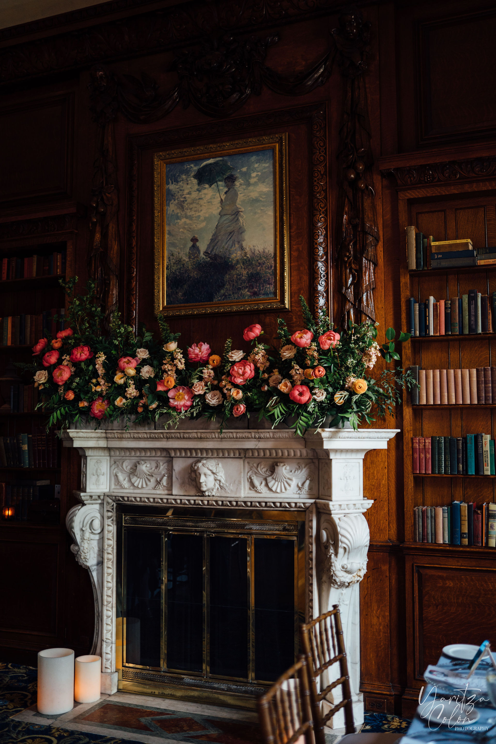 a fire place sitting in a living room filled with furniture and a fireplace