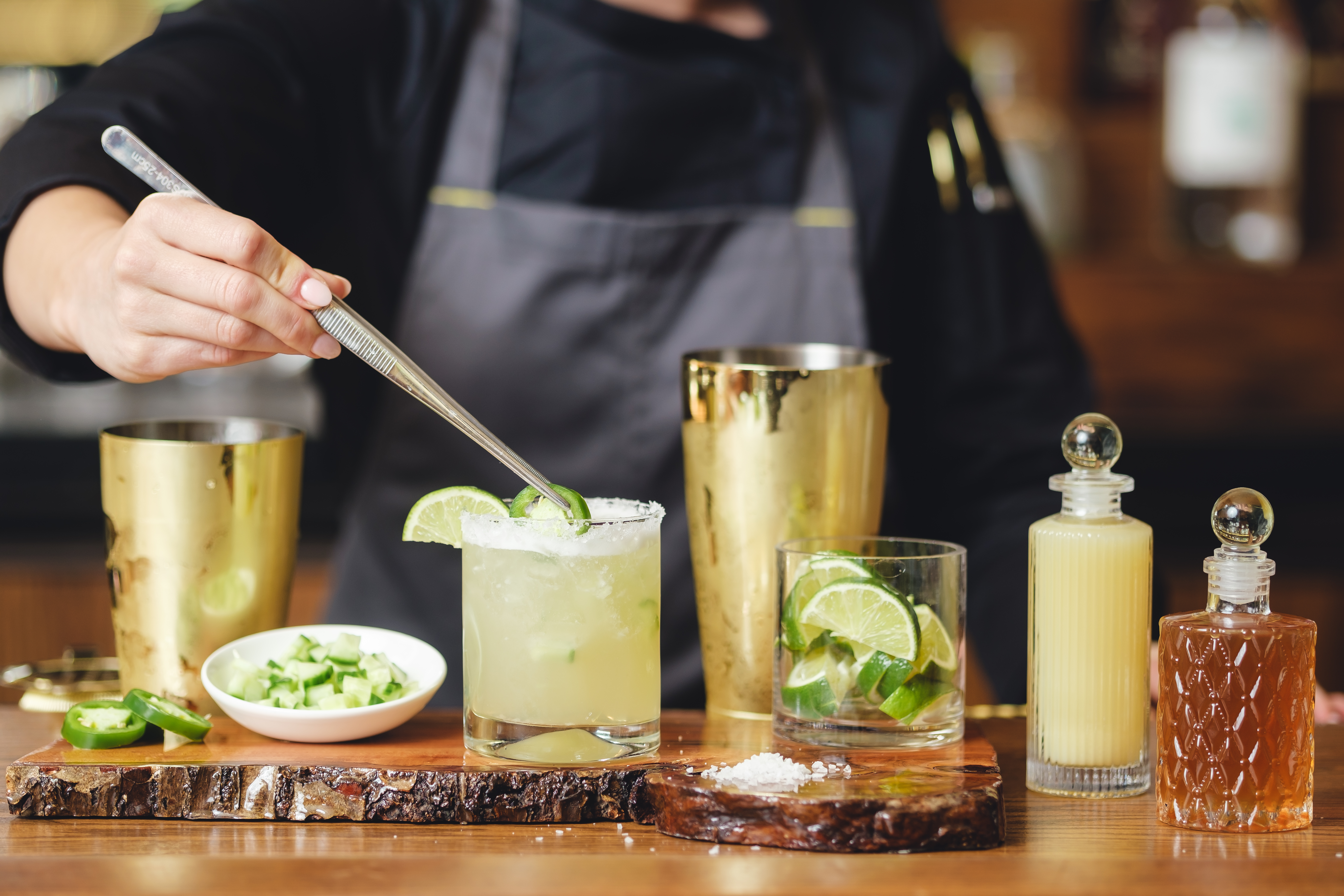 a person sitting at a table with a plate of food