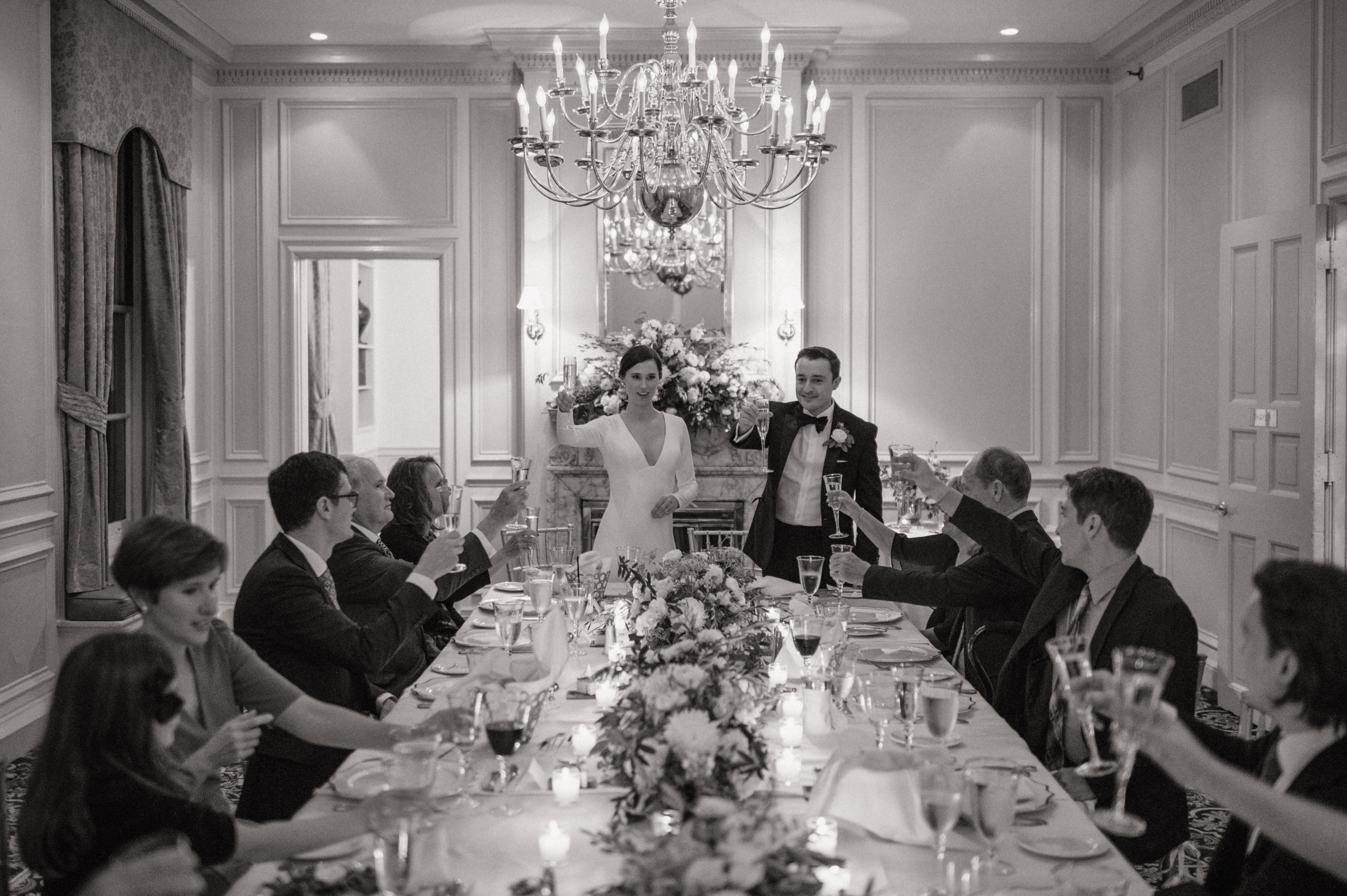 people sitting around a set table