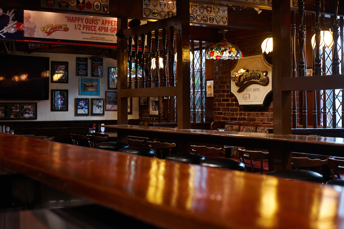 a bar with tables and chairs