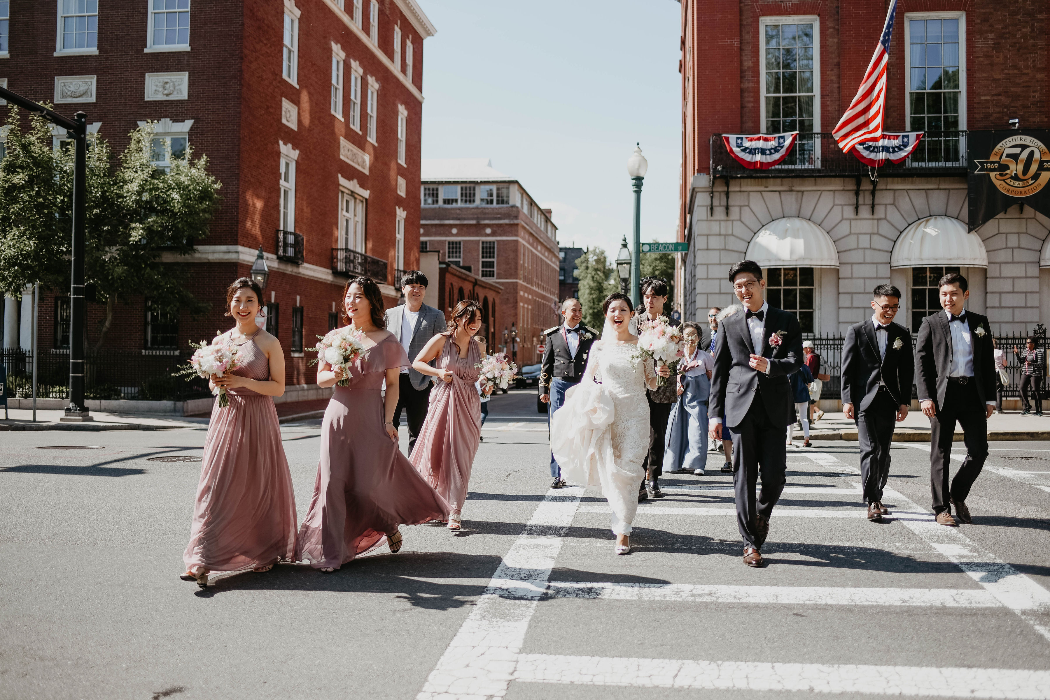 a group of people walking down the street