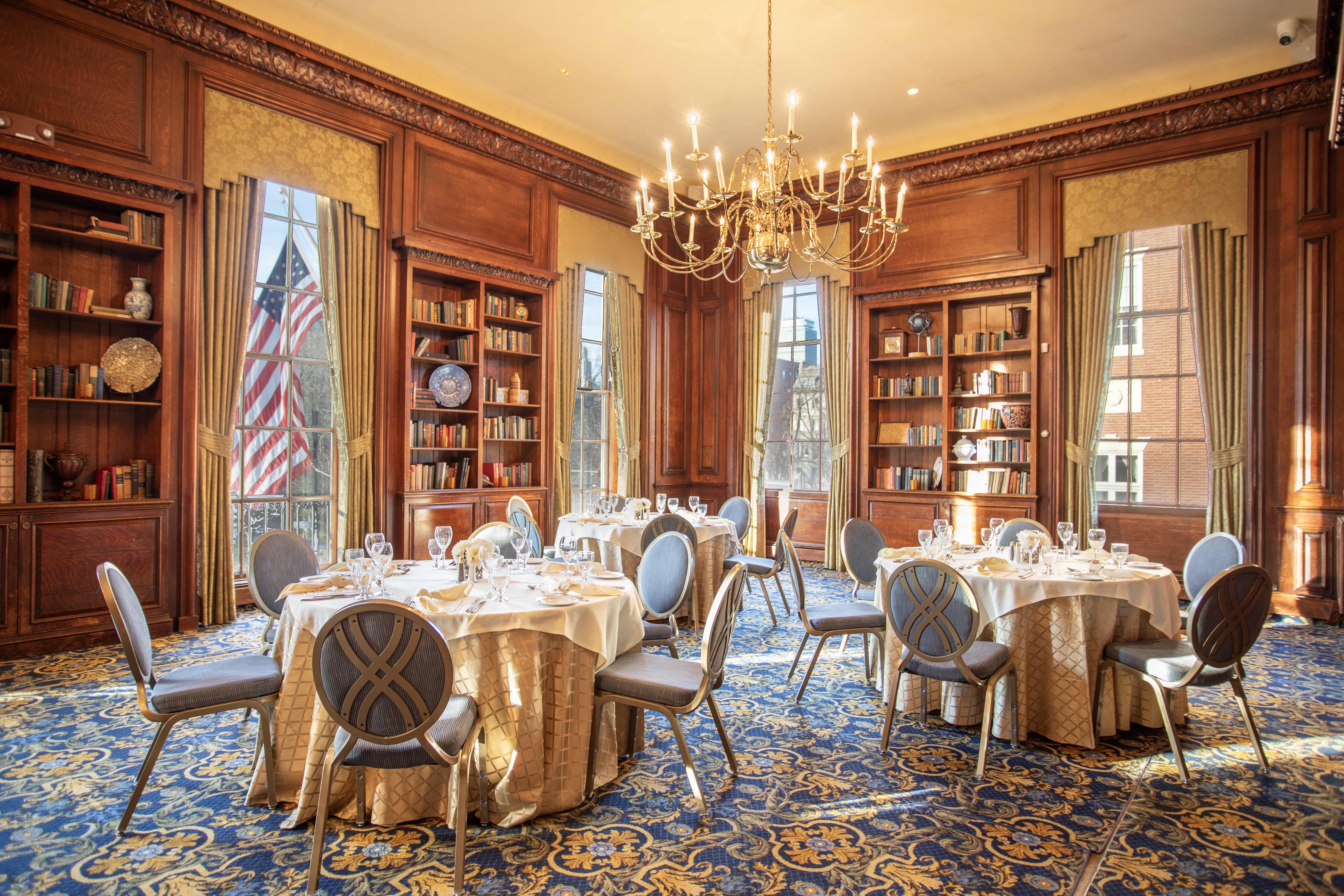 a living room filled with furniture and a fireplace