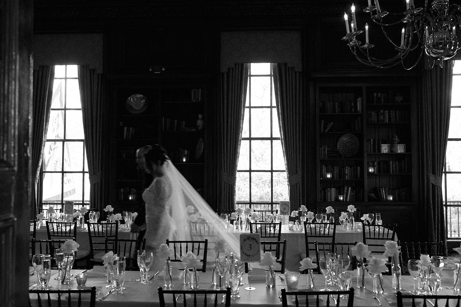 a dining room table in front of a window