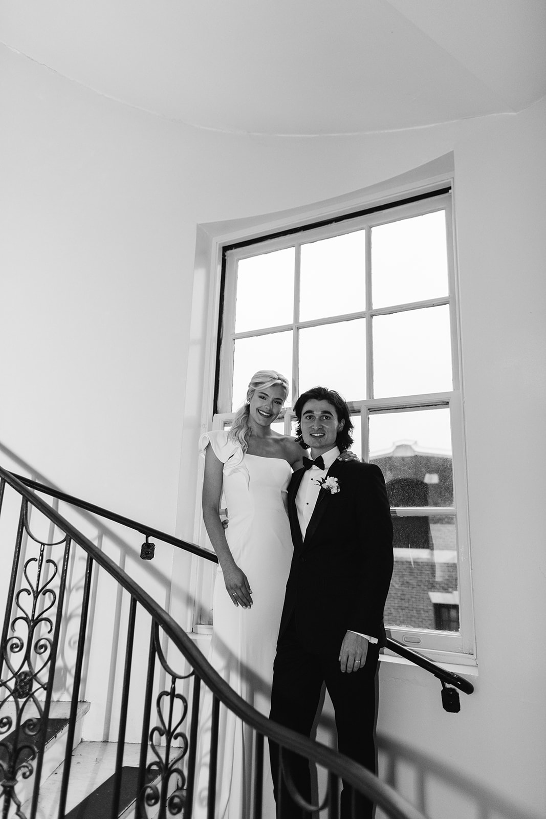 a person standing in front of a mirror posing for the camera