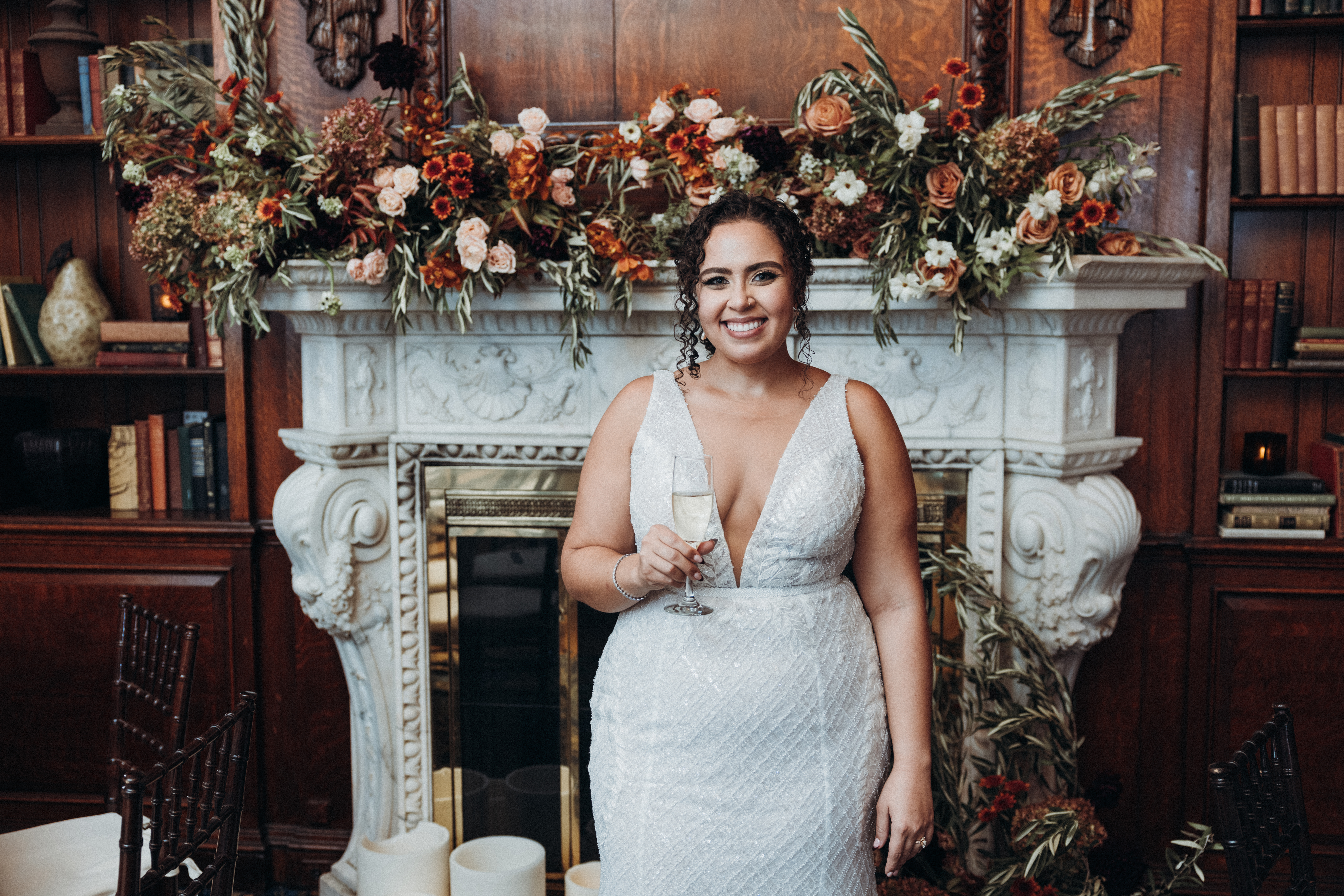 a woman standing in front of a statue