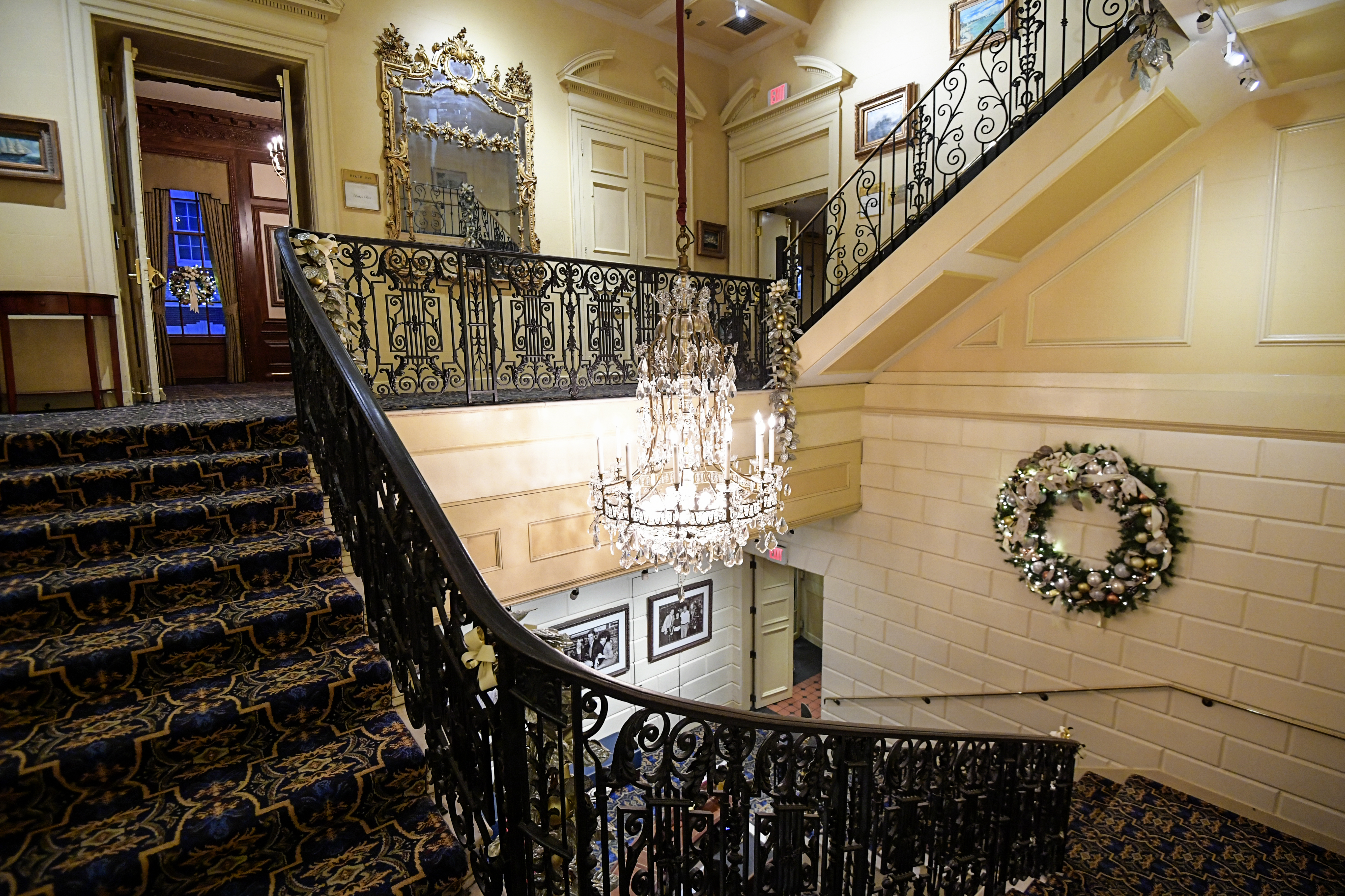 the lobby of a building with a staircase