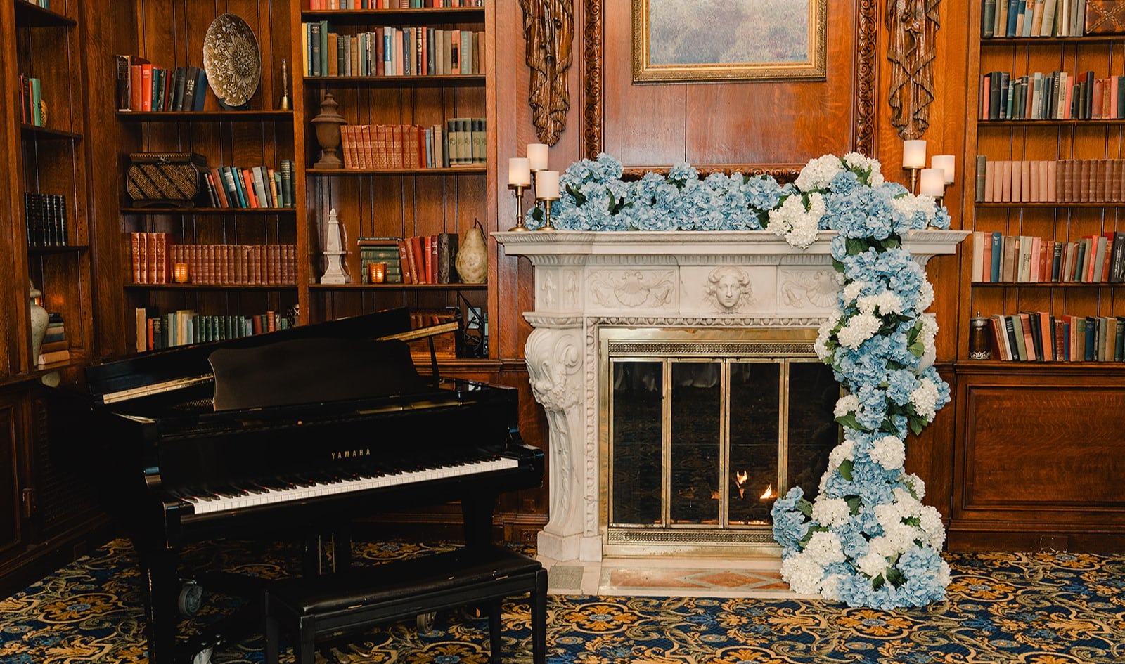 a living room filled with furniture and a book shelf