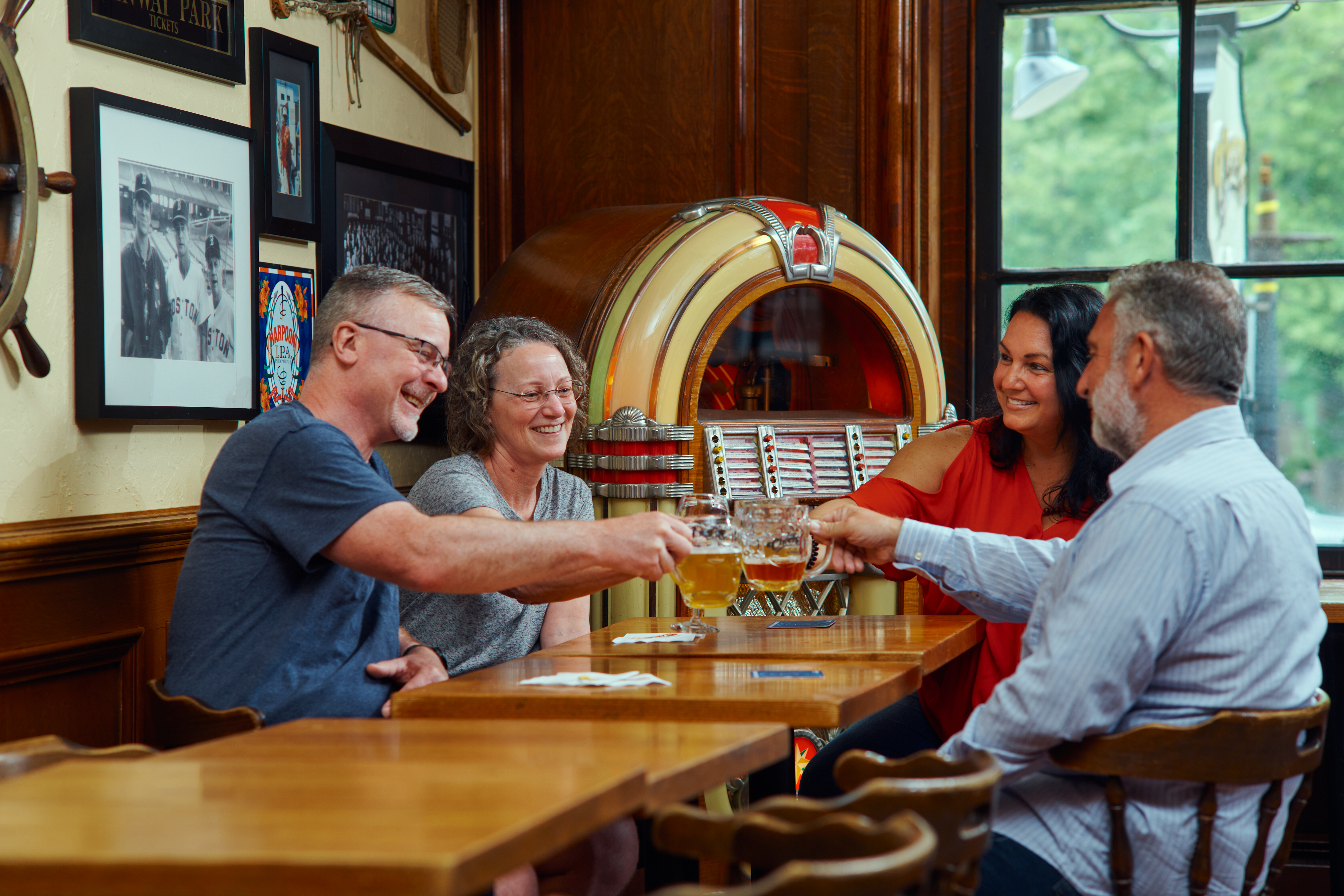 a group of people holding drinks