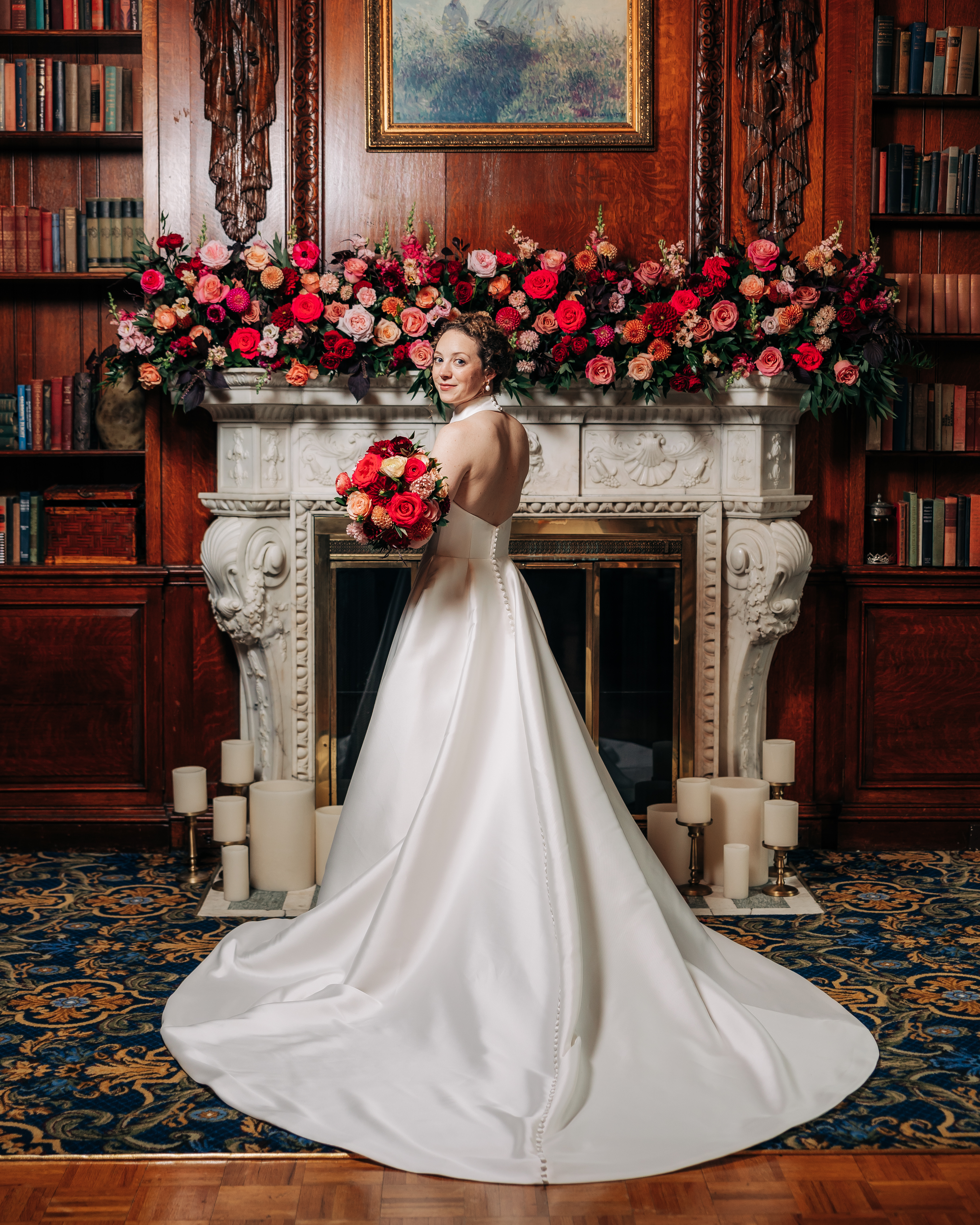 a living room filled with furniture and a fire place