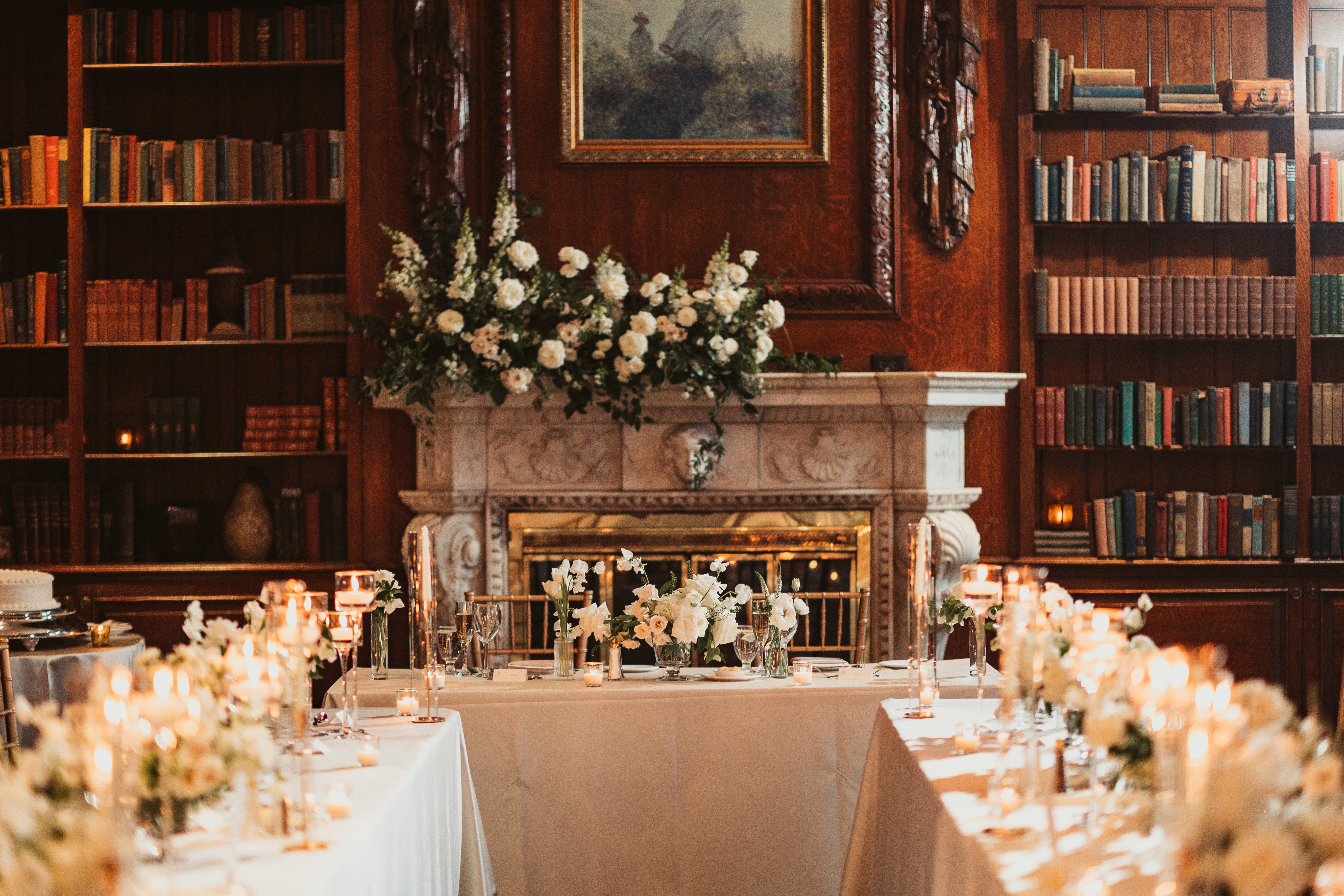 a set table in front of a fireplace