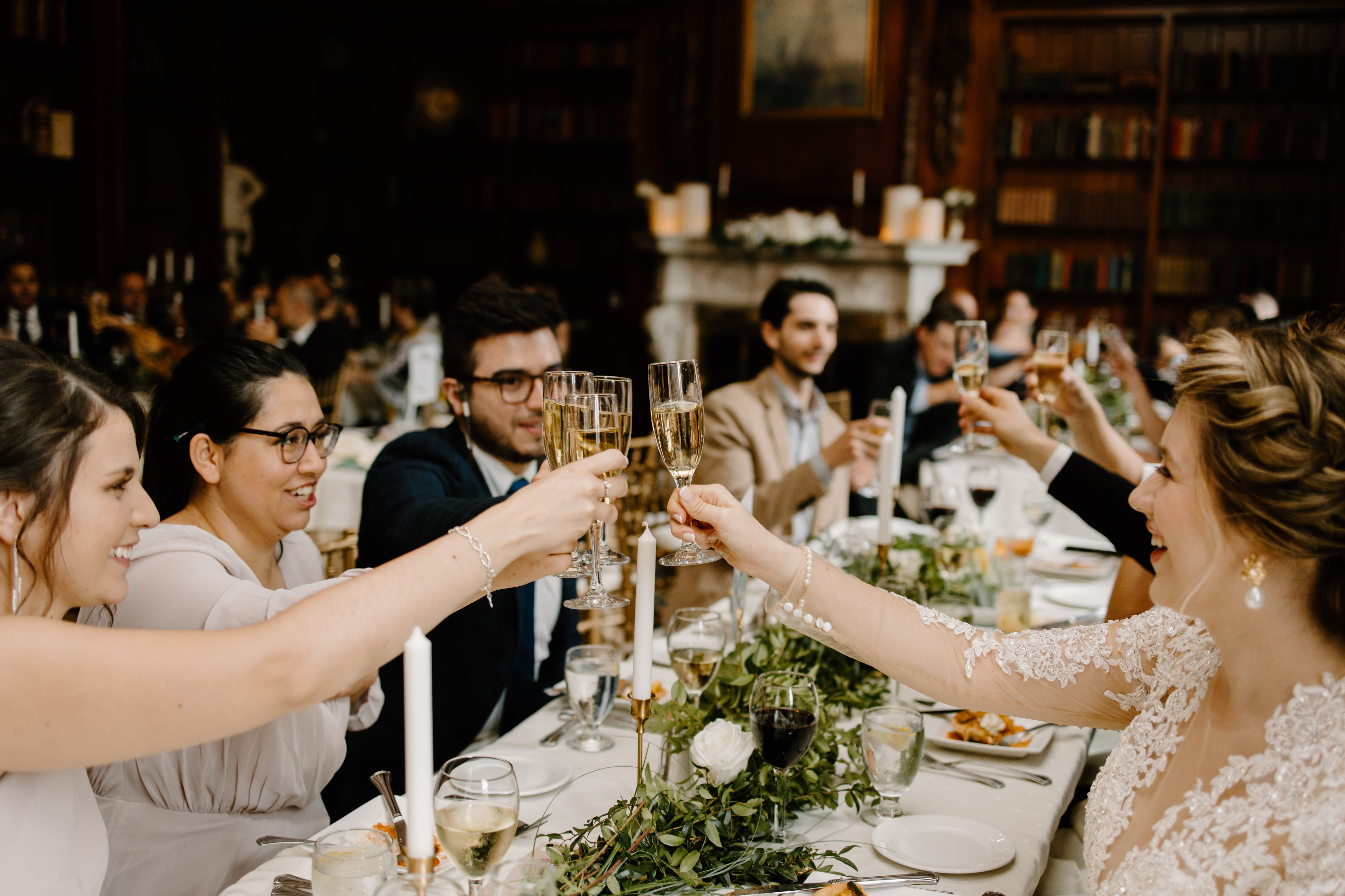 people sitting around a set table