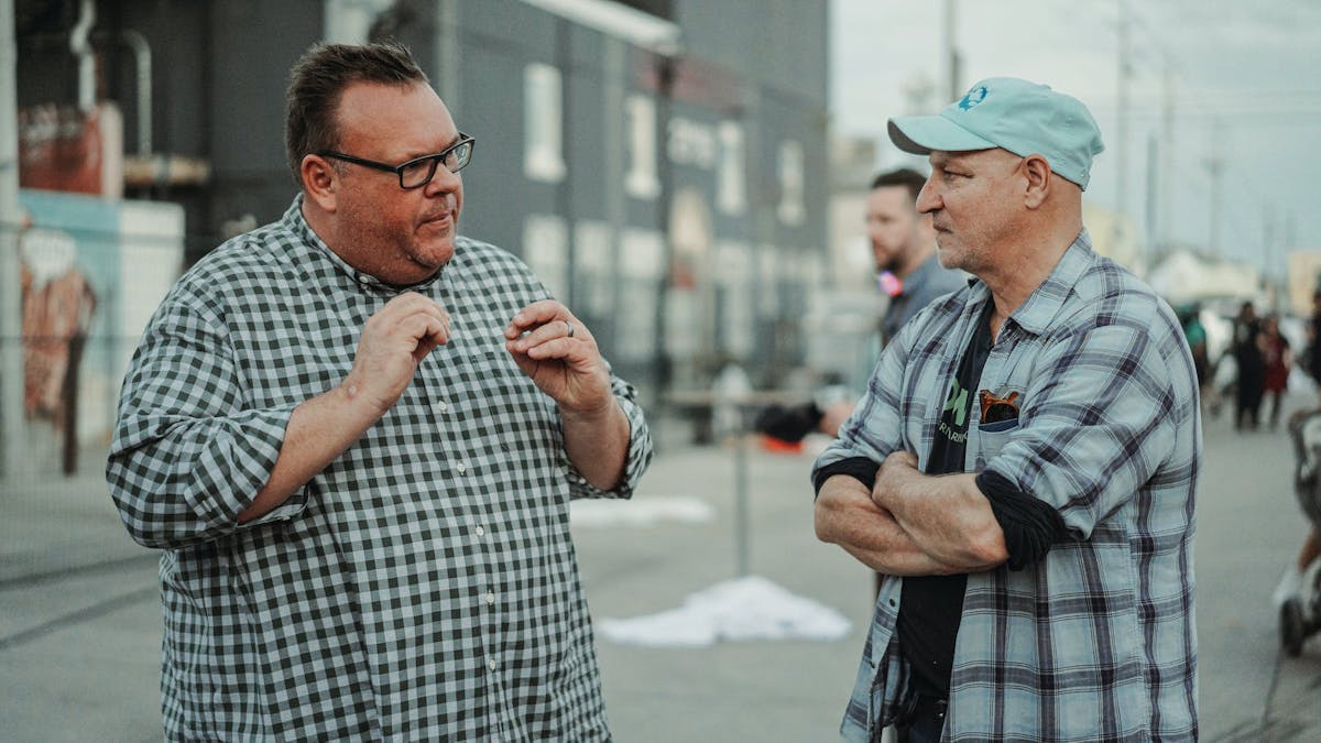 two men talking