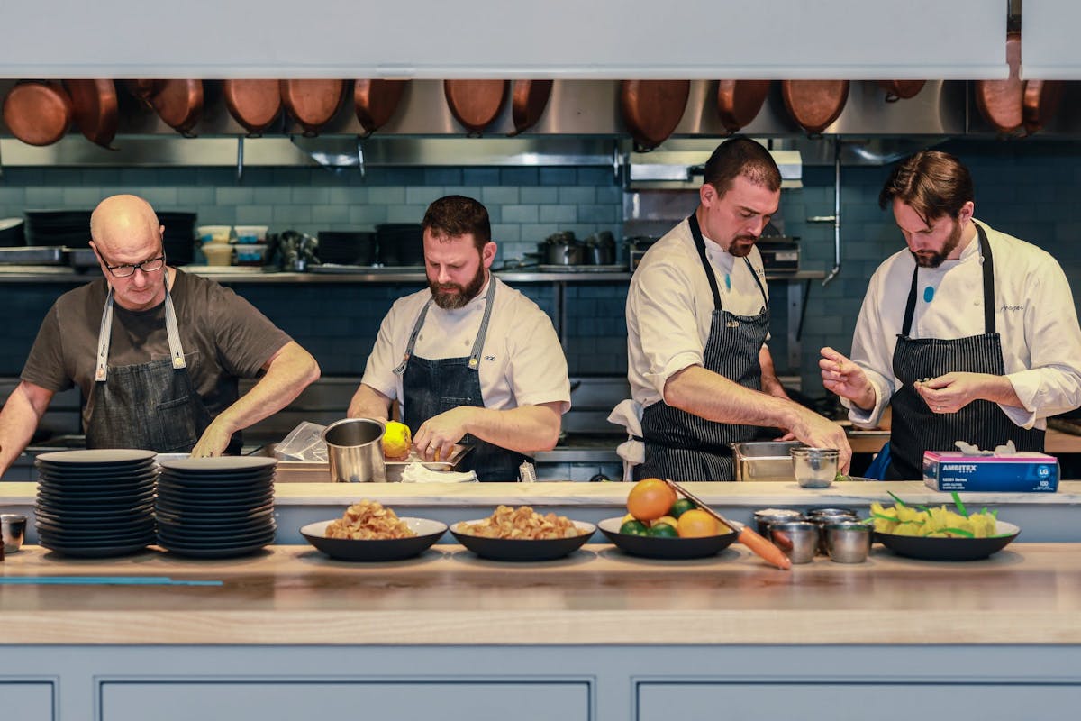 a group of chefs cooking