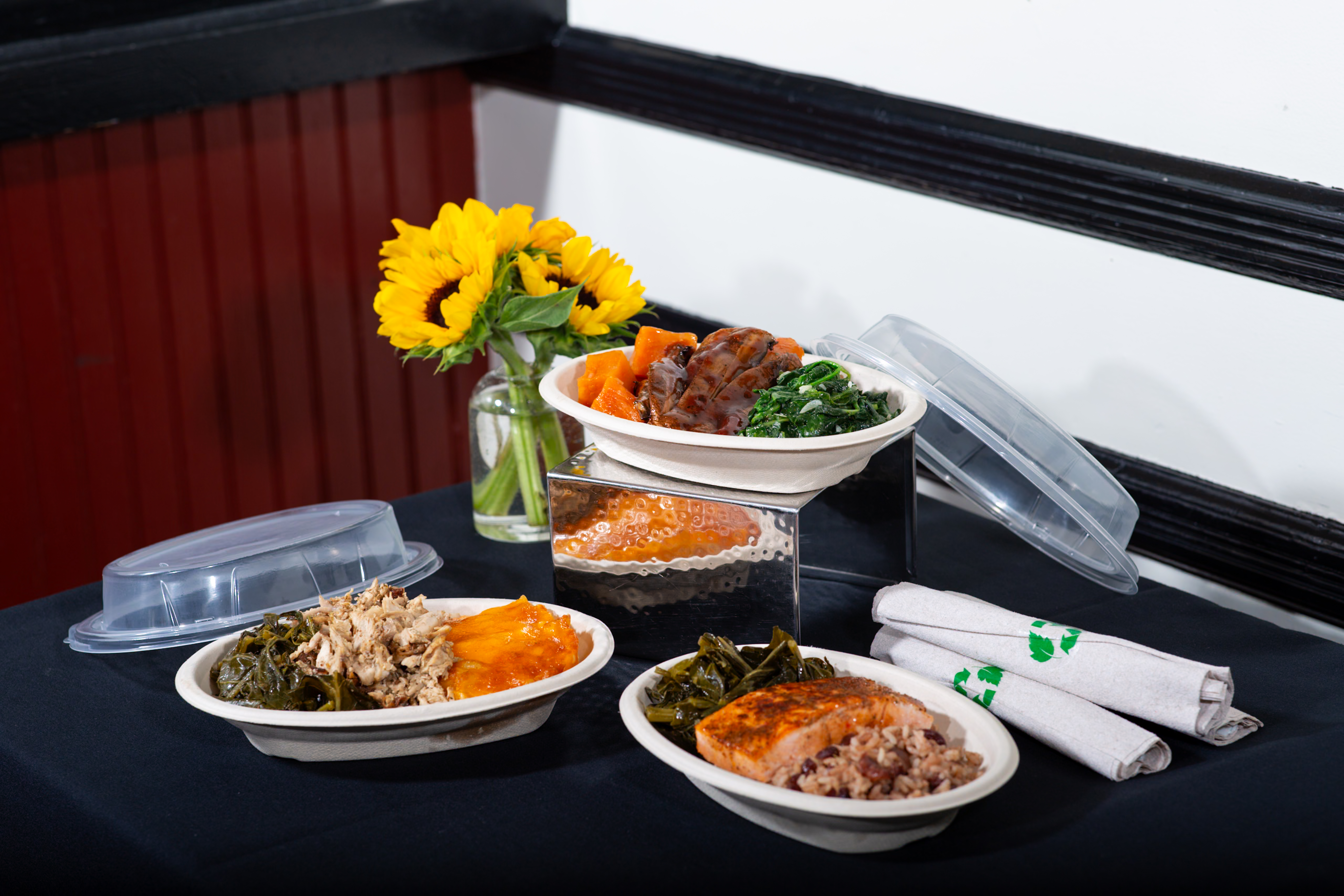 a tray of food on a plate on a table