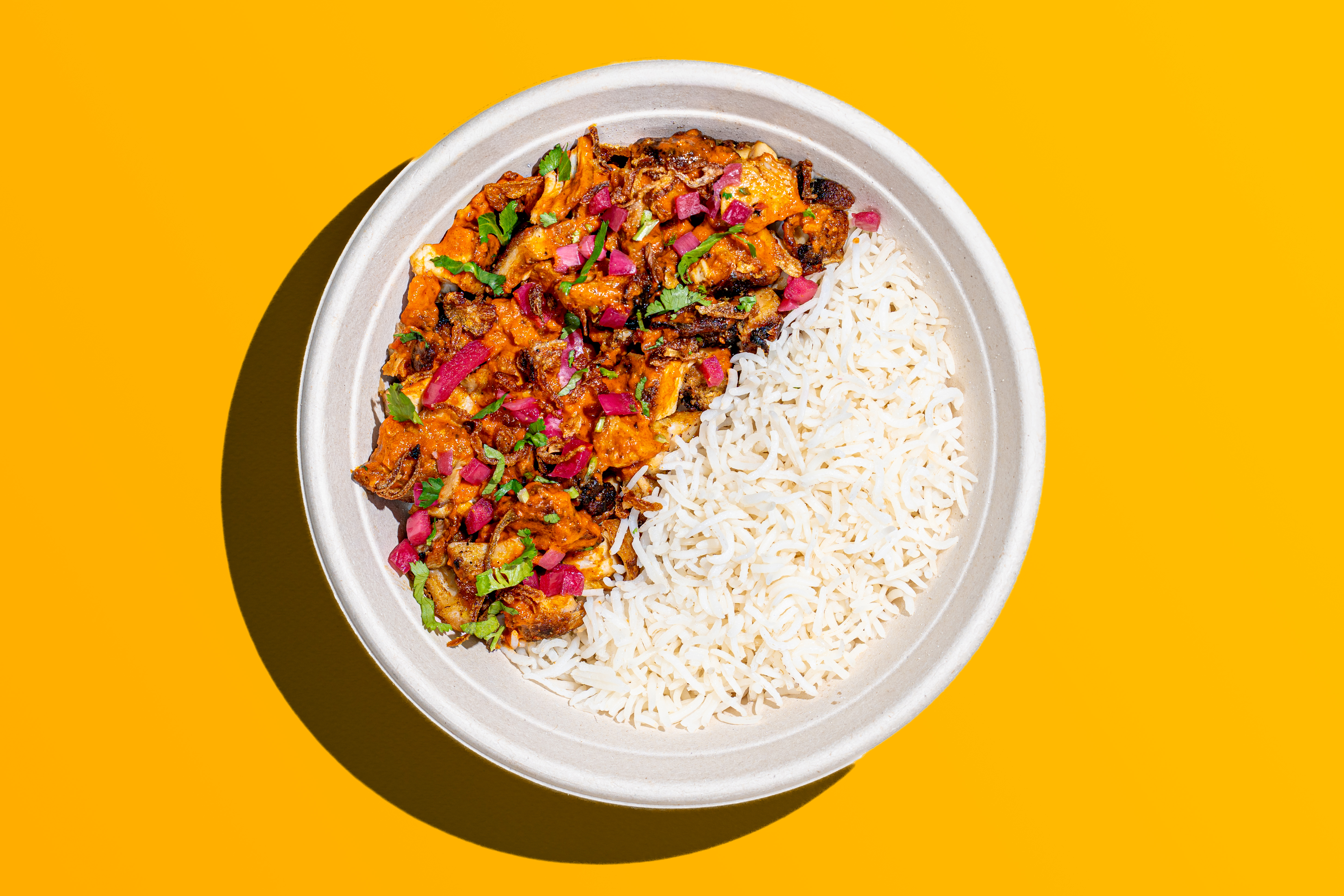 a bowl of food with rice