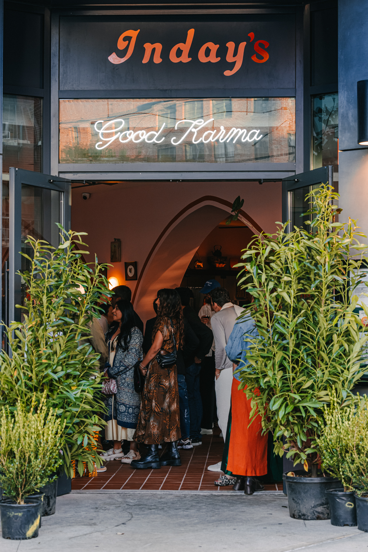 a group of people standing in front of a building