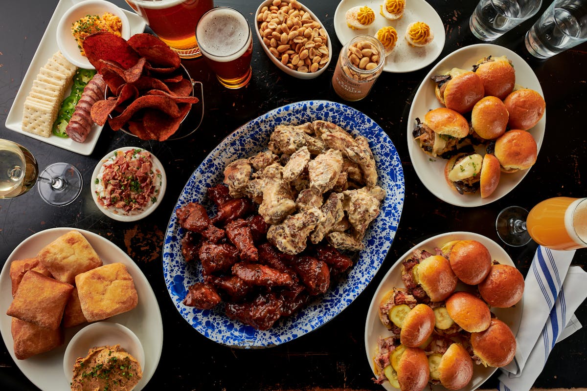 A table full of Blue Smoke barbecue