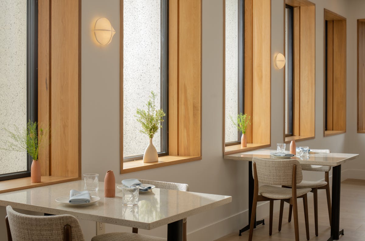 a table that has a sink and a mirror