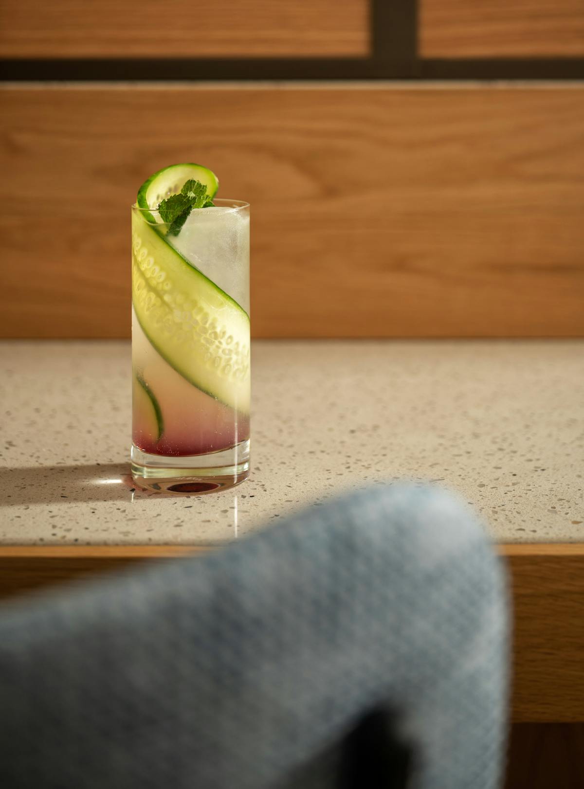a vase sitting on top of a wooden table