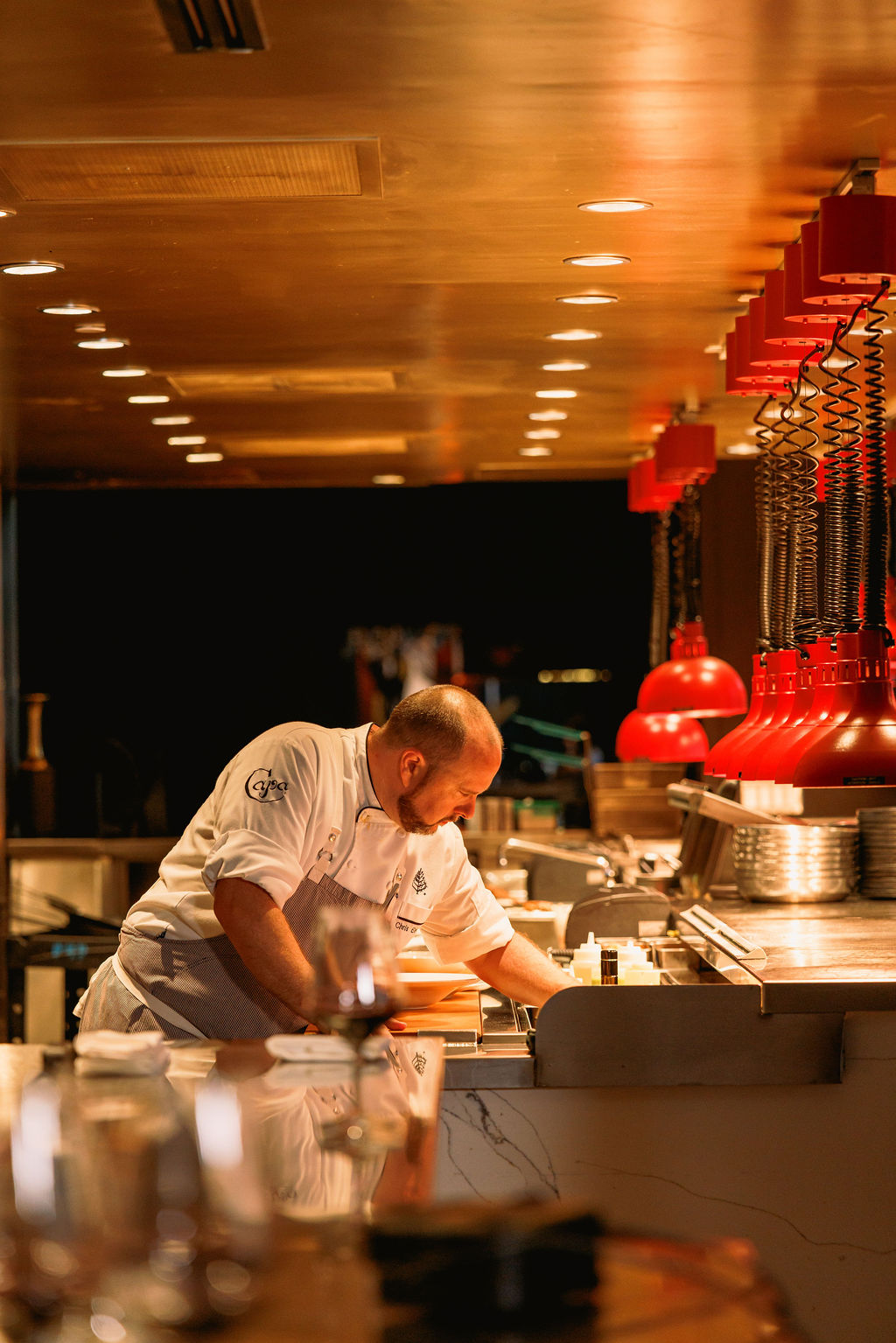 a man in a restaurant kitchen