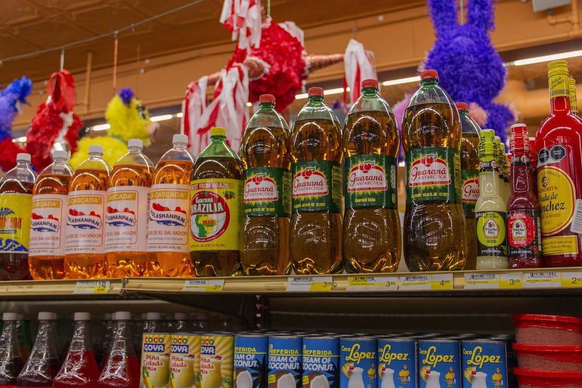 a bunch of bananas on display in a store