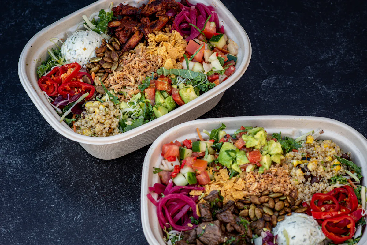 a plastic container filled with different types of food