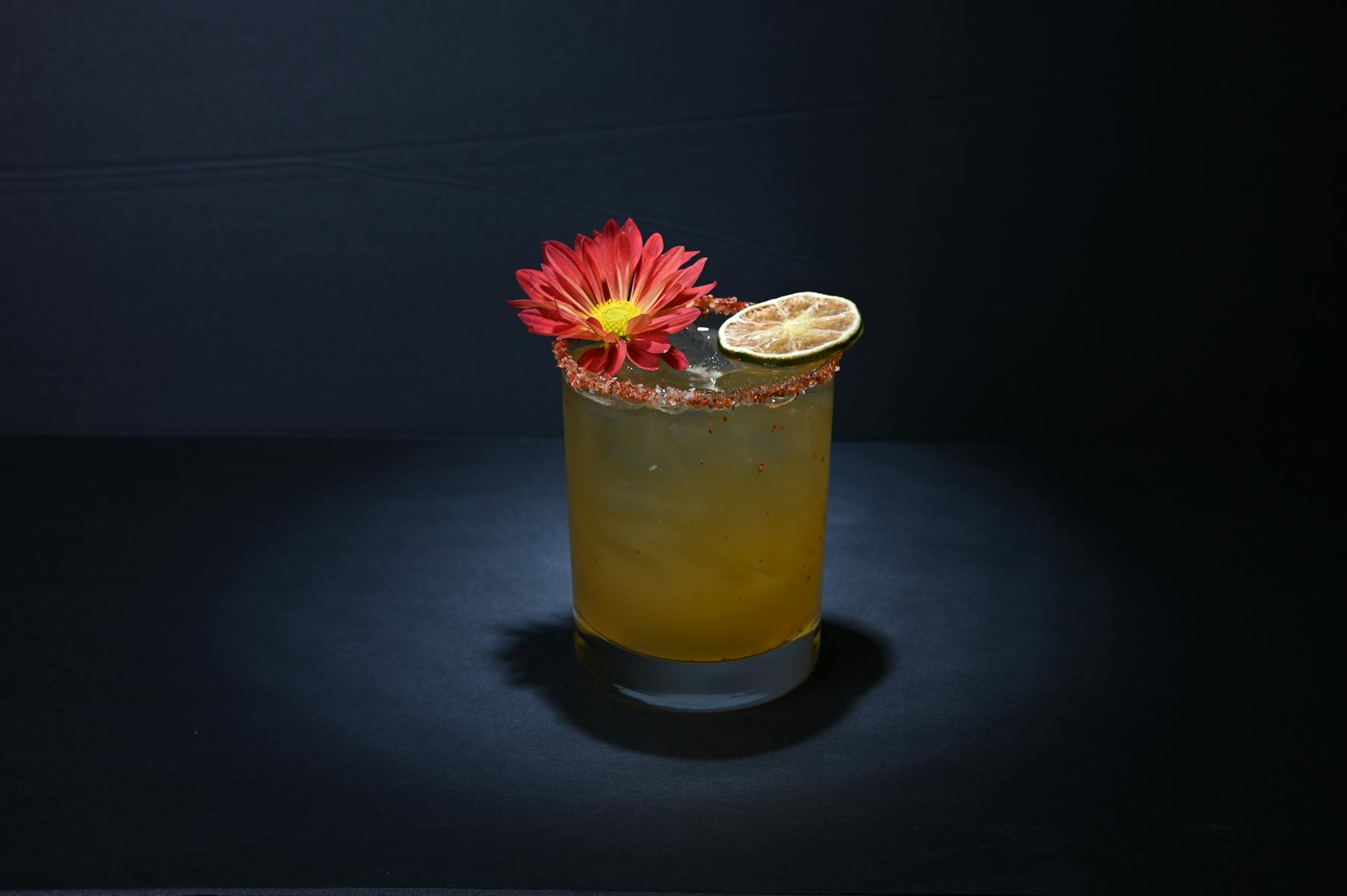 a vase filled with flowers sitting on a table