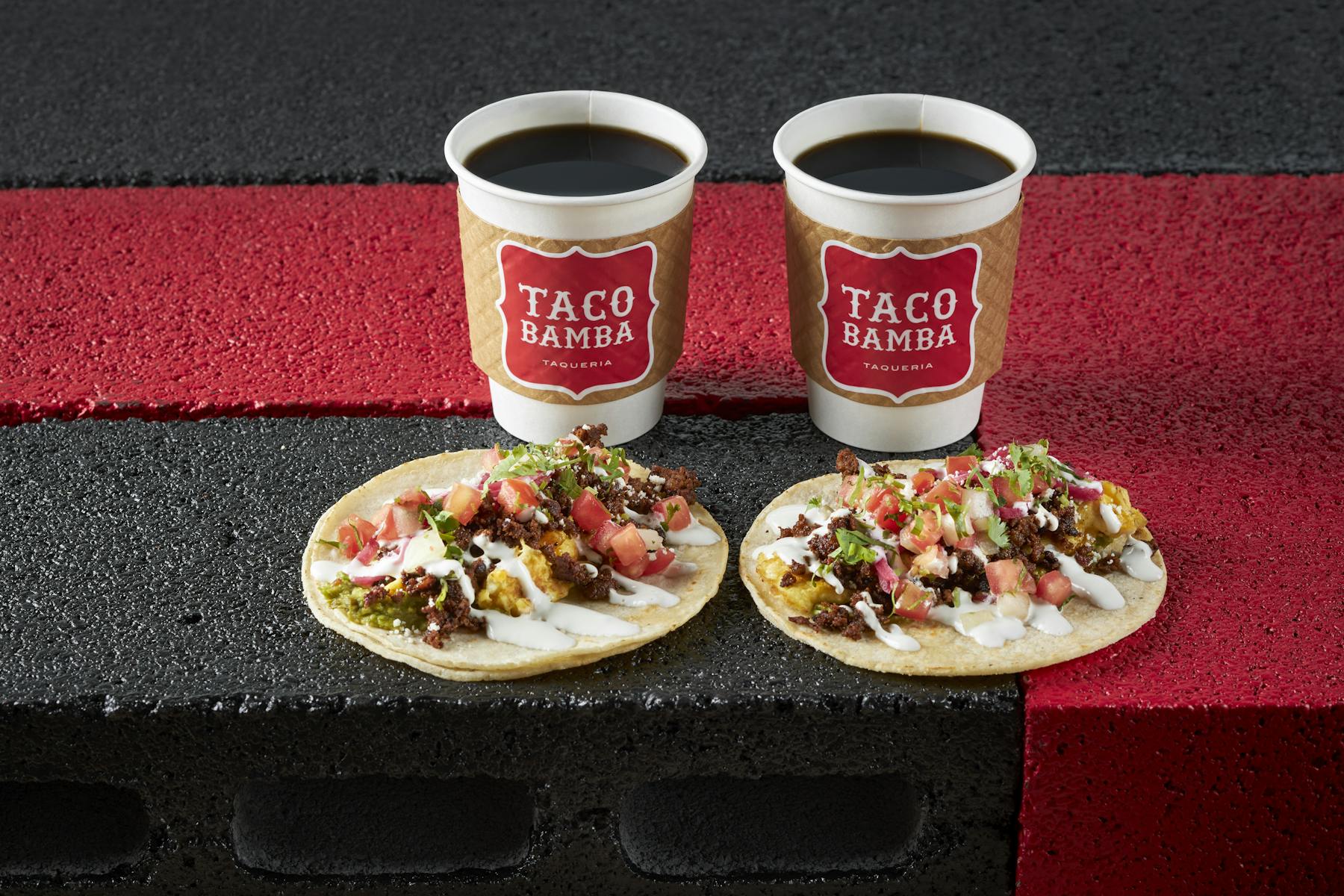 two cups of coffee and two tacos