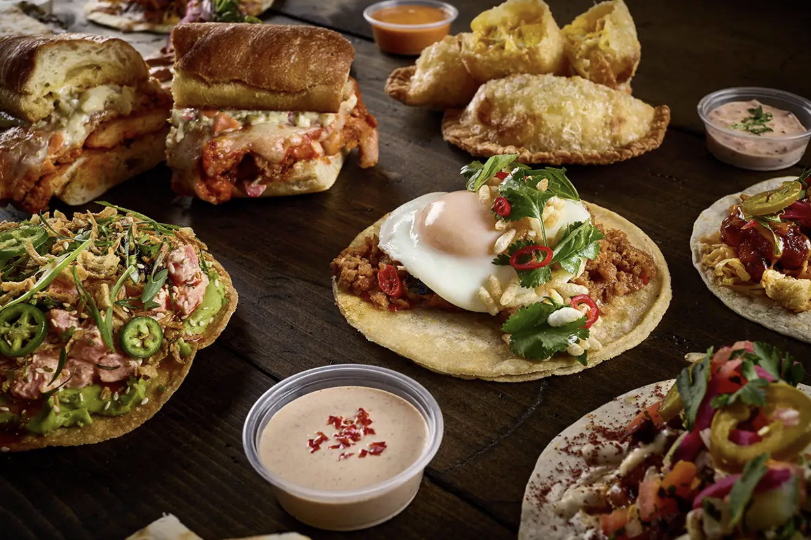 a bunch of different types of food on a table