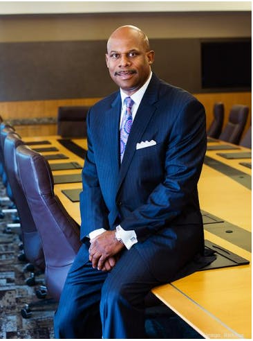 a man wearing a suit and tie