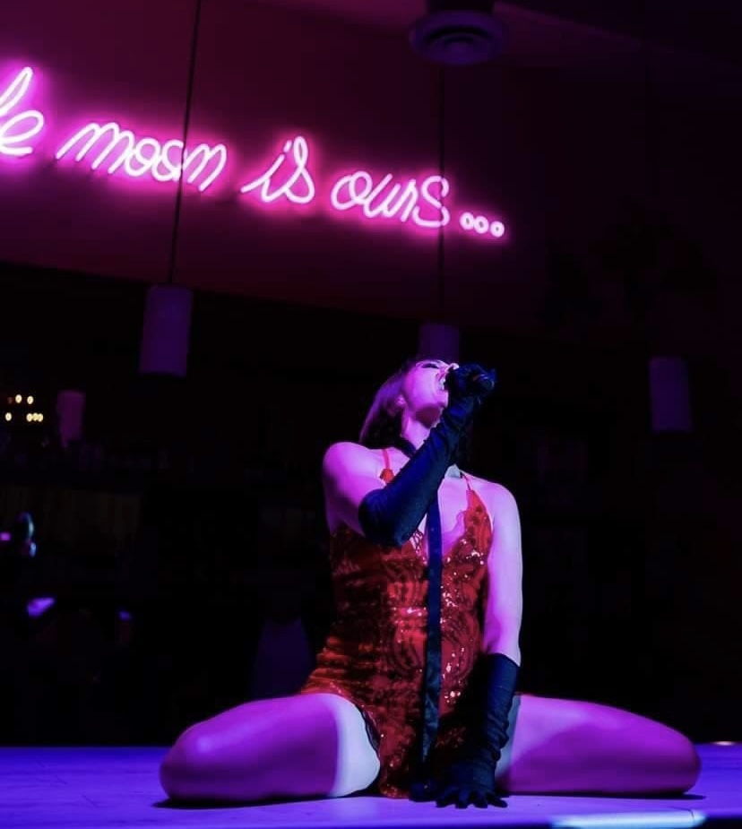 a person standing on a stage