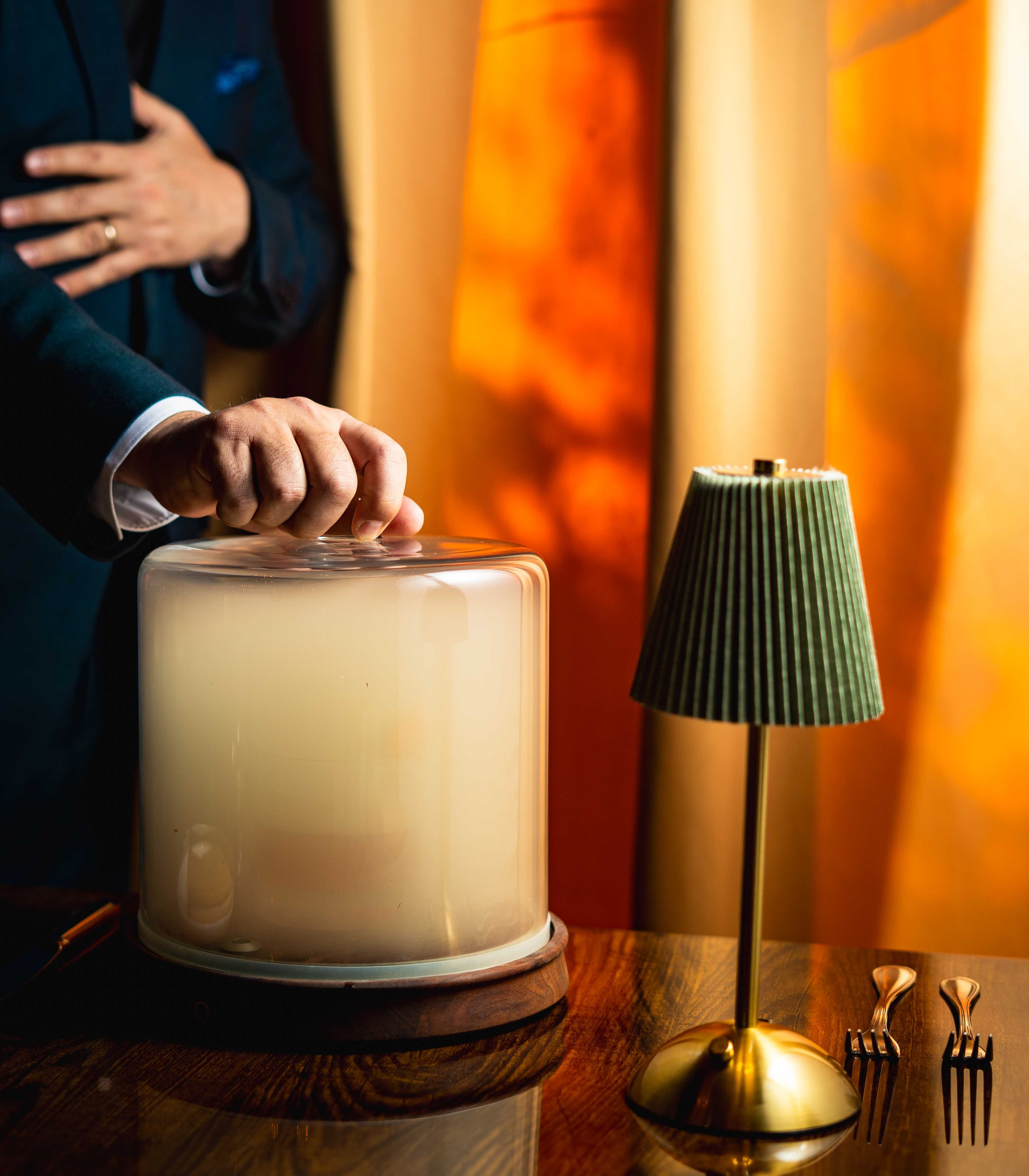 a person holding a cup