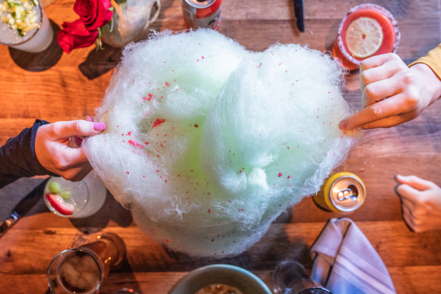 a person holding a bowl of food