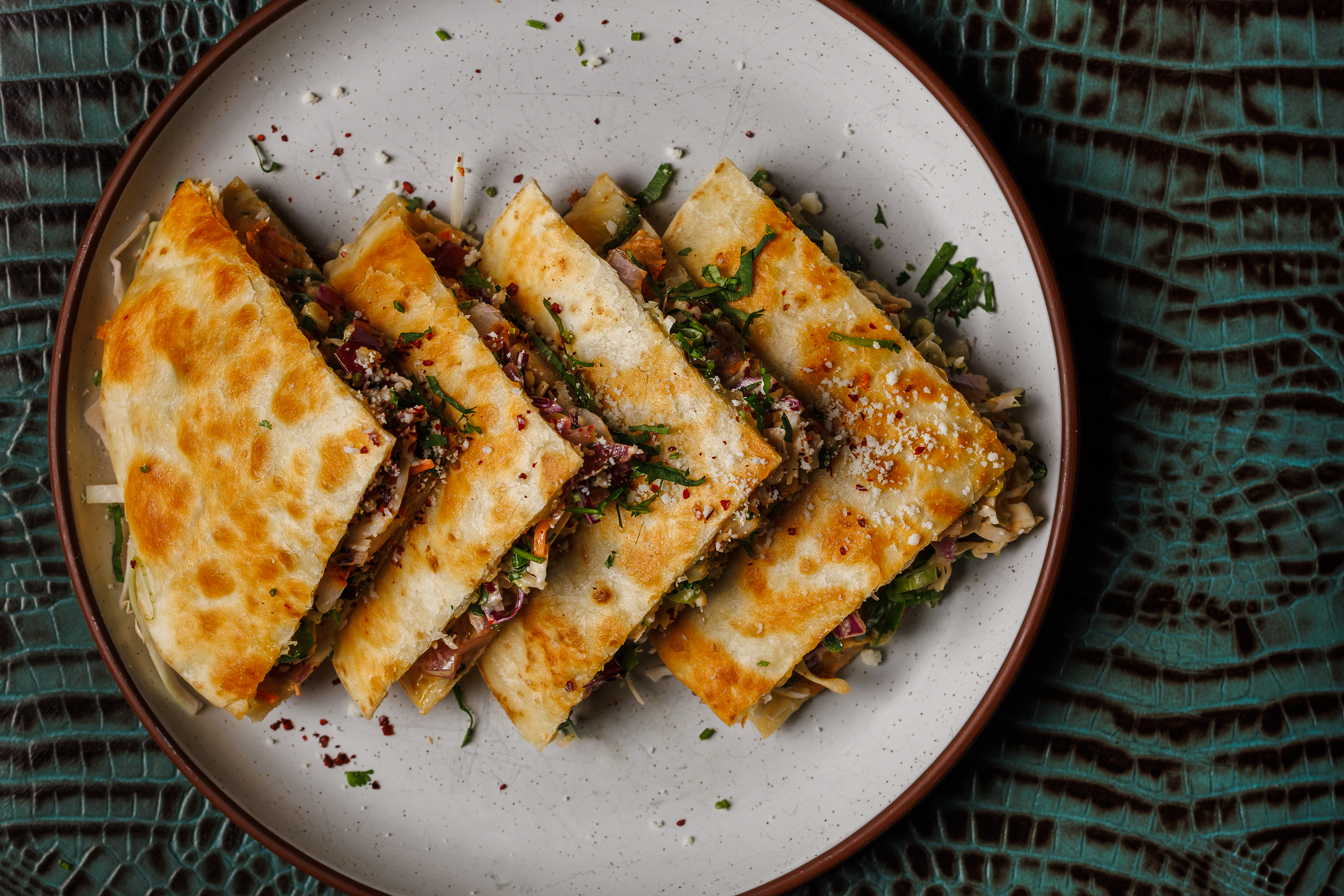 Baja Shrimp  grilled mexican blue prawns, baja slaw, corn, horseradish crema, pepper jack