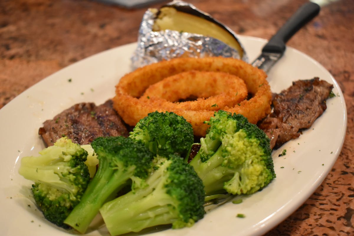 a plate of food with broccoli