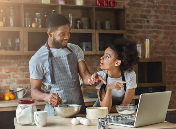 a man and a woman sitting at a table