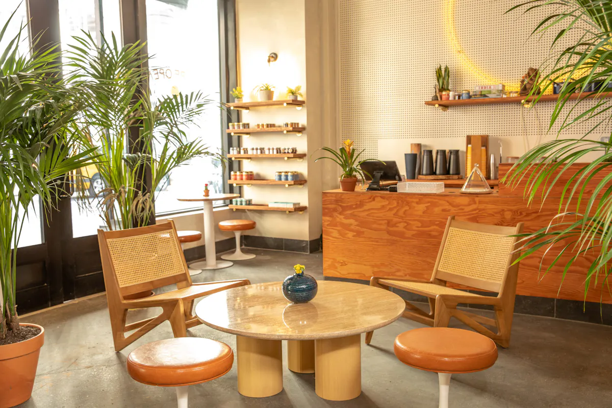 a dining room table in front of a window