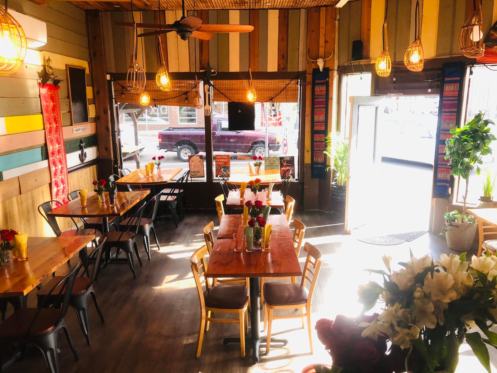 a room filled with furniture and a table in a restaurant