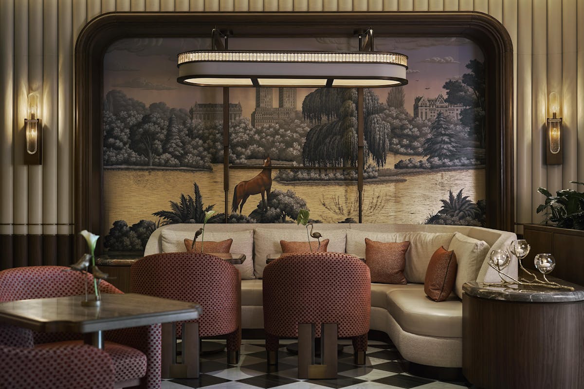 a living room filled with furniture and a fireplace