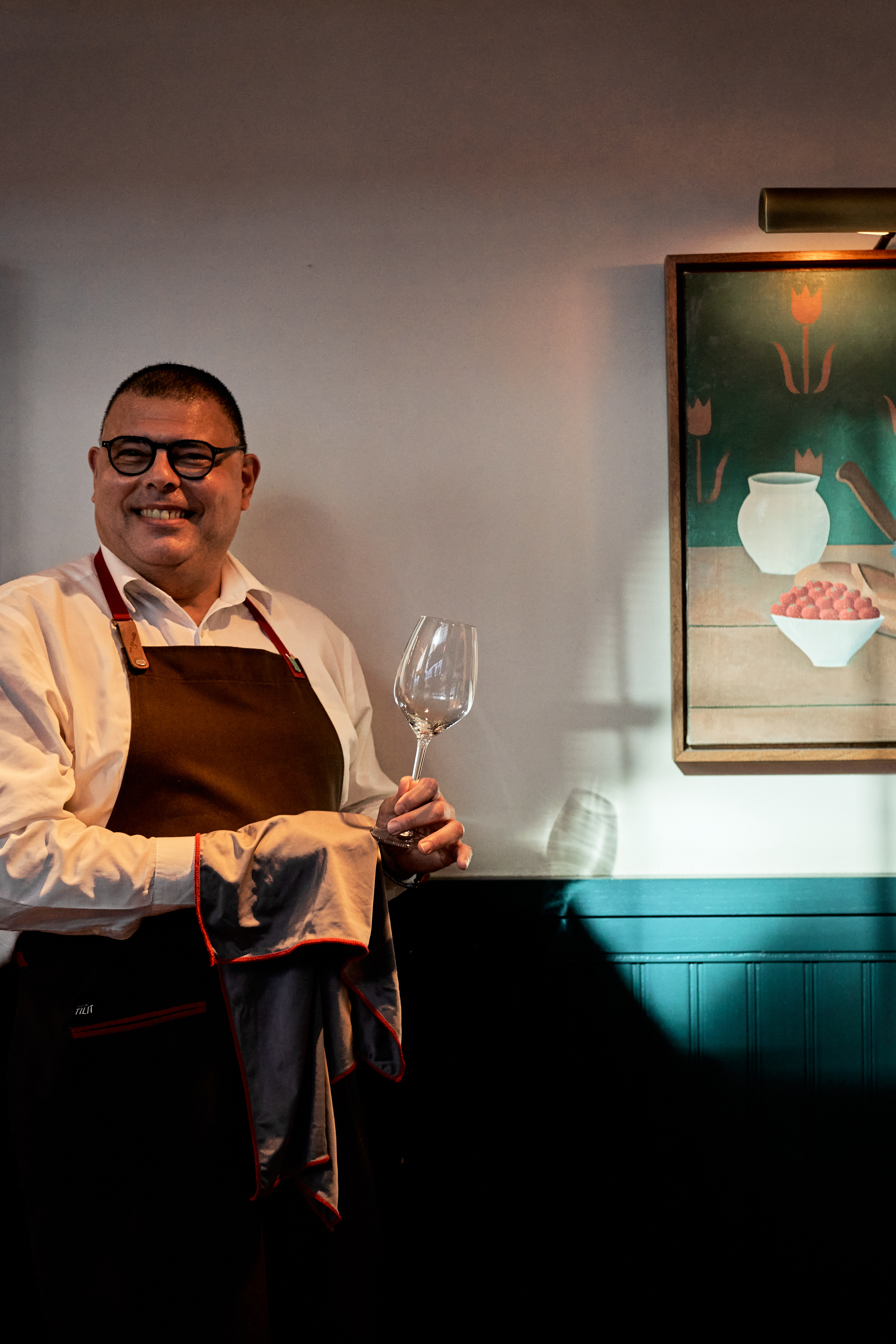 a person holding a glass of wine