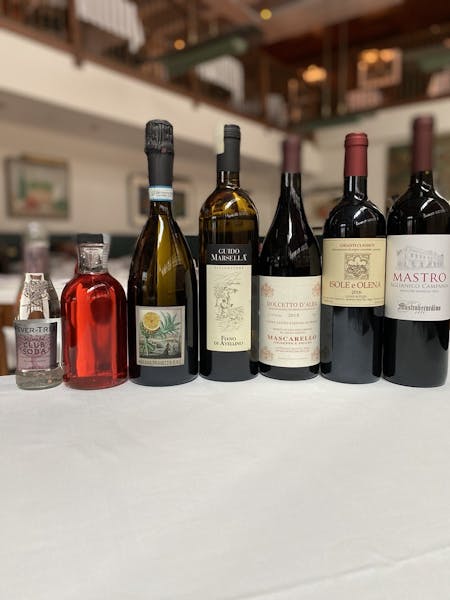 5 bottles of wine and the USC Spritz Kit on a table