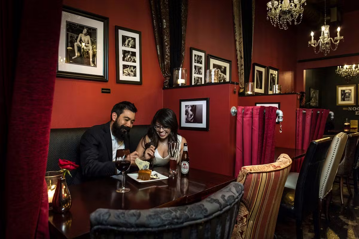 a couple eating cake