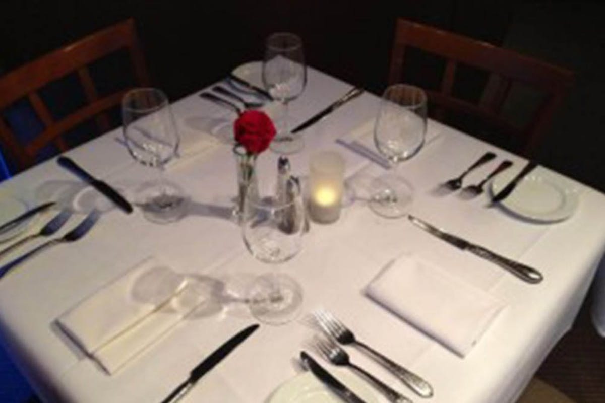 a table with wine glasses