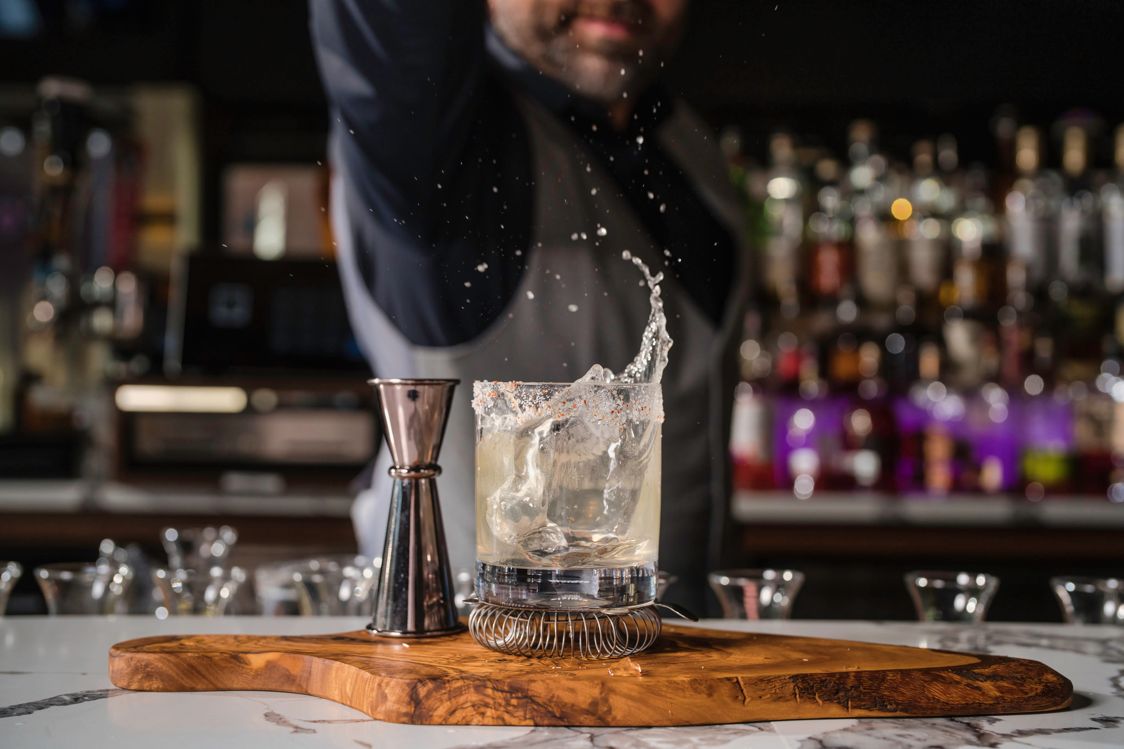 glass being filled with a drink